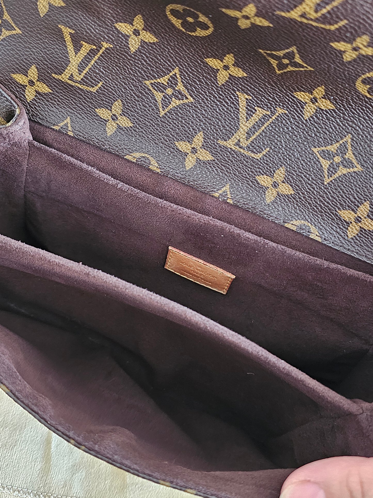 Louis Vuitton Pochette Métis monogram kanvas.