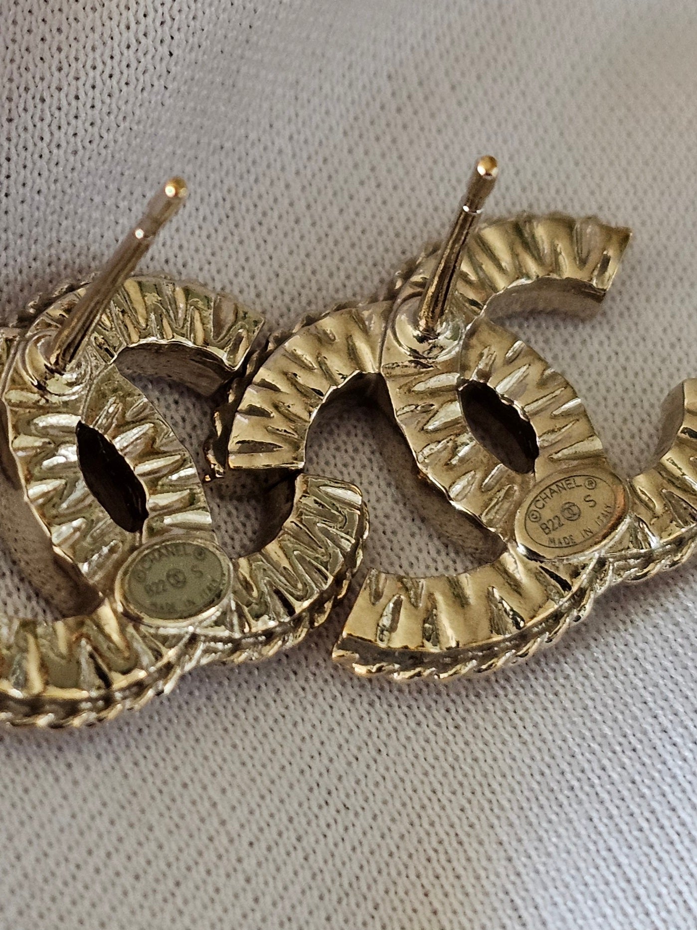 Chanel earrings, golden cc with stones.