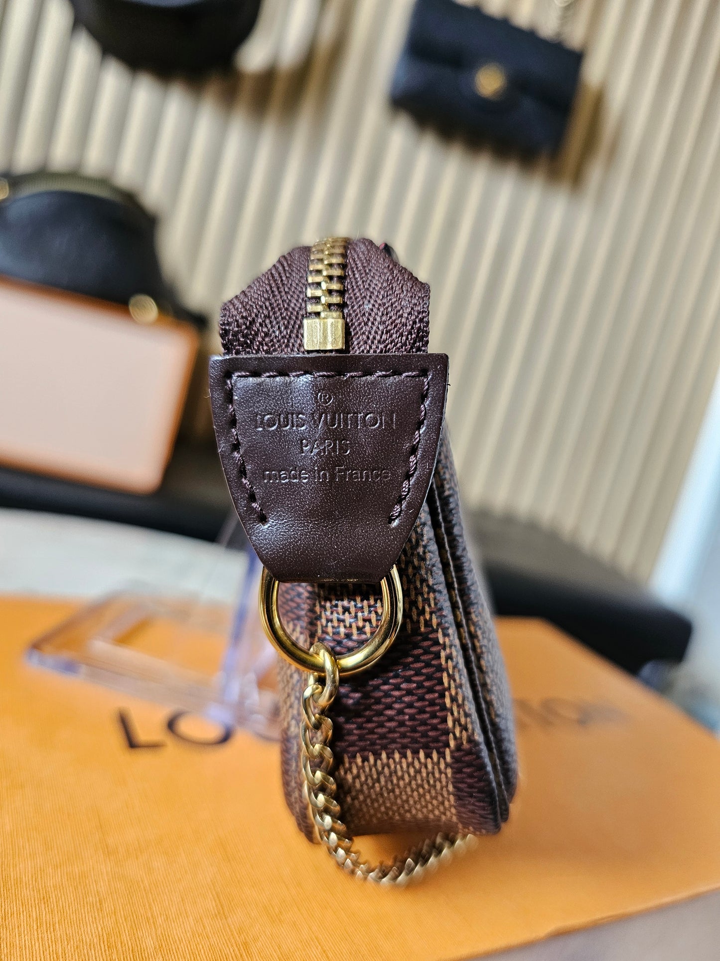 Louis Vuitton - mini pochette Acc. Damier ebene.