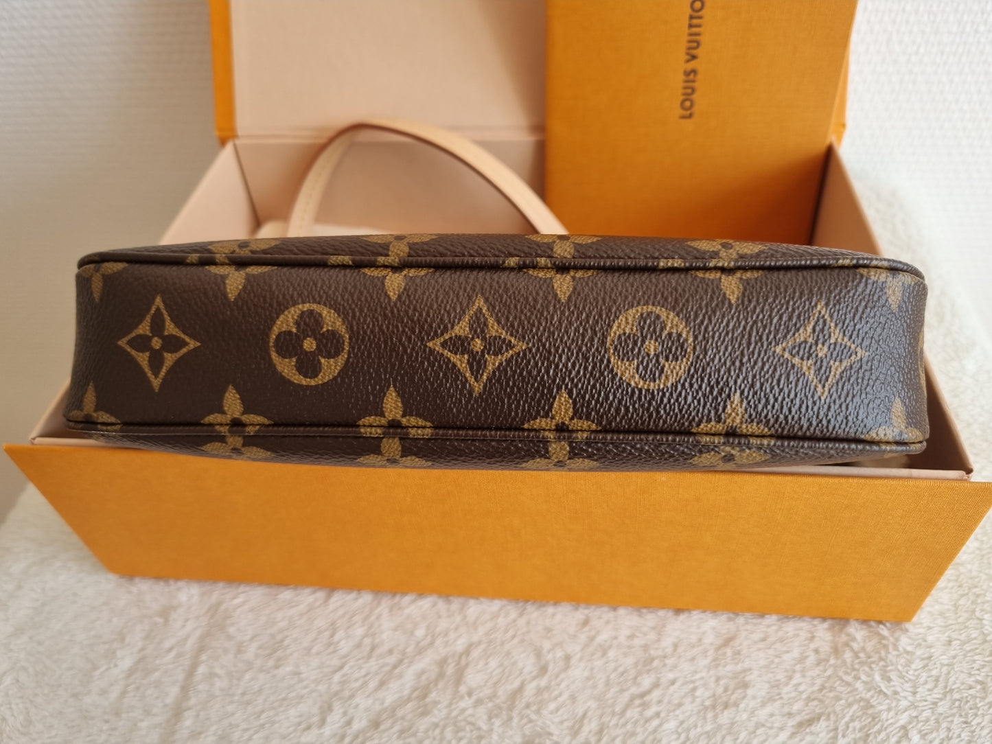 Louis vuitton pochette accesories NM I monogram kanvas.