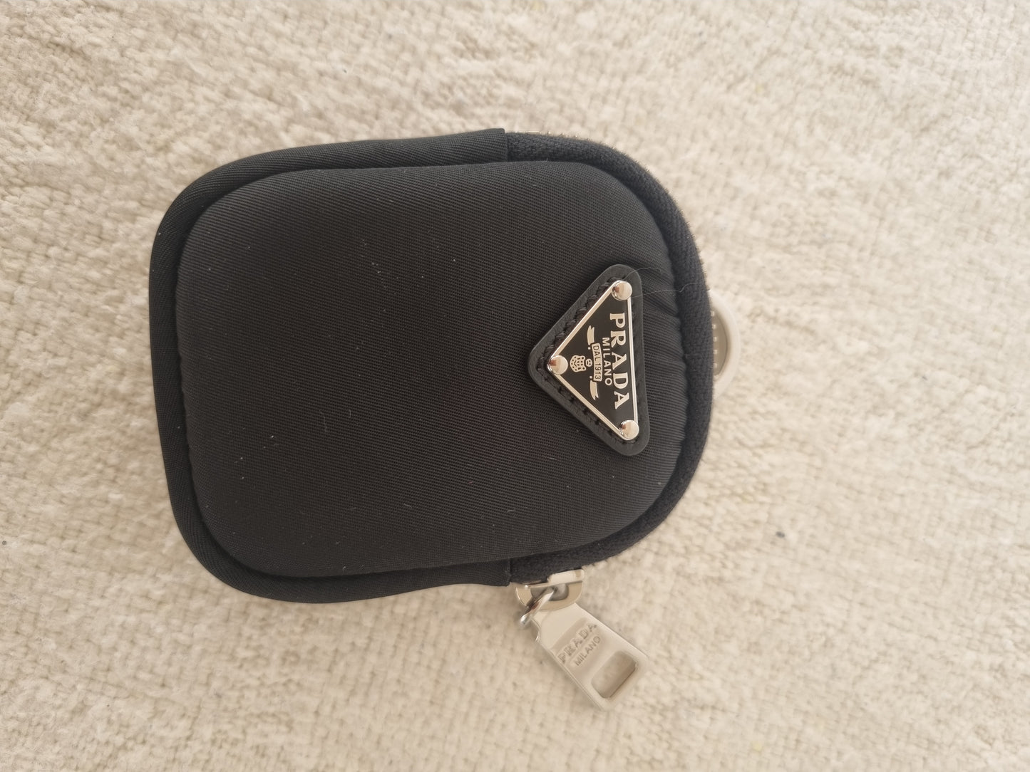 Prada pung - airpods case.