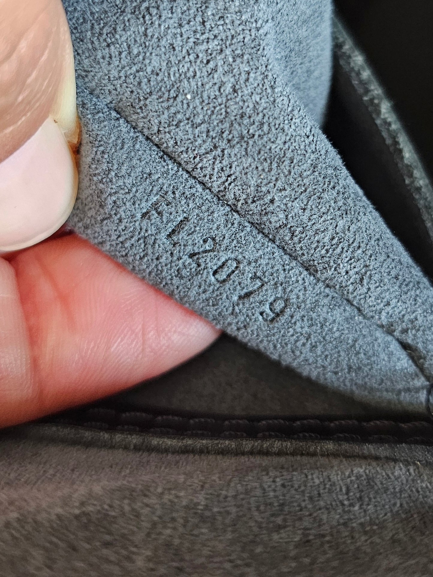 Louis Vuitton Alma PM with adjustable shoulder strap.