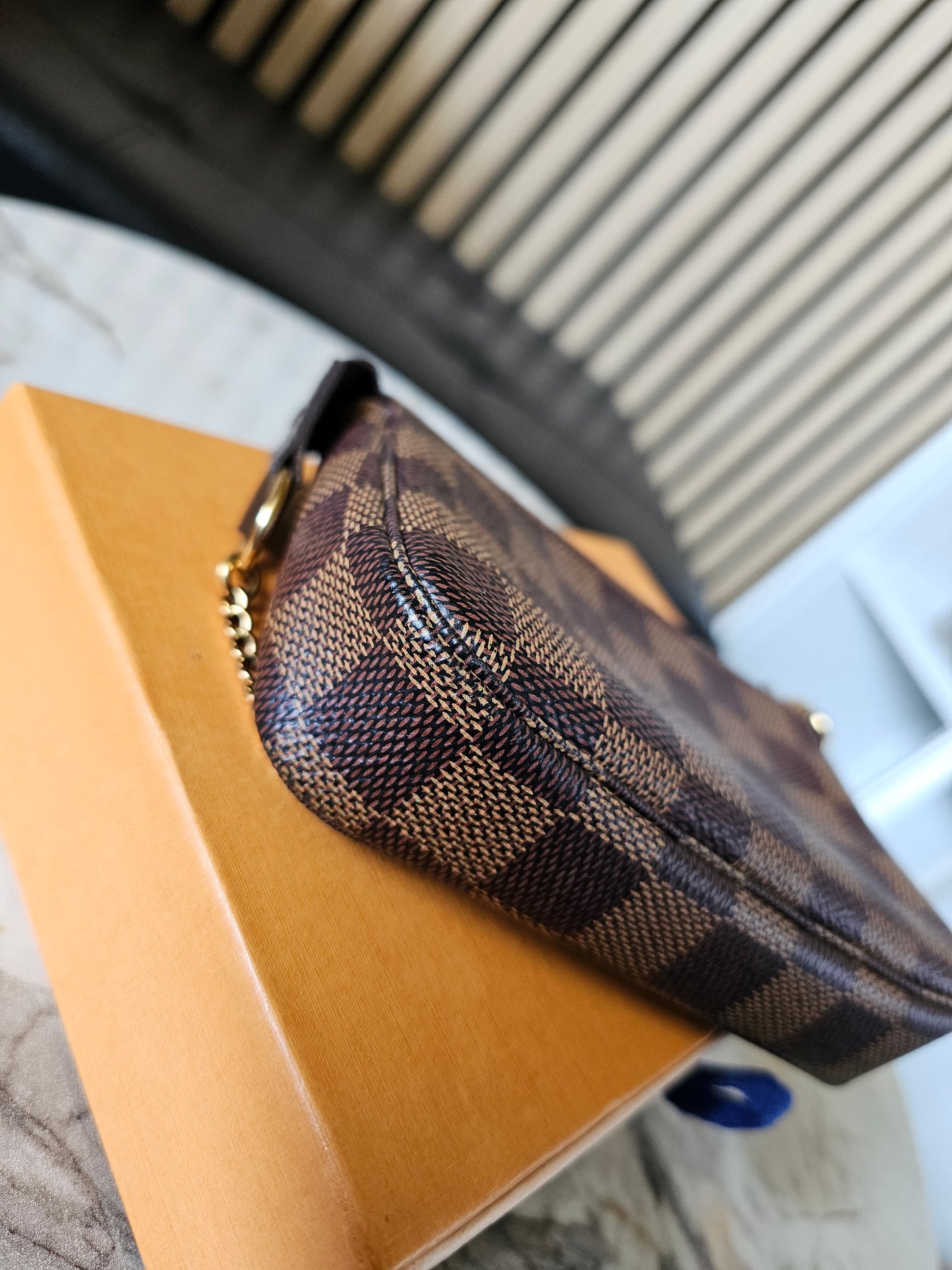 Louis Vuitton - mini pochette Acc. Damier ebene.