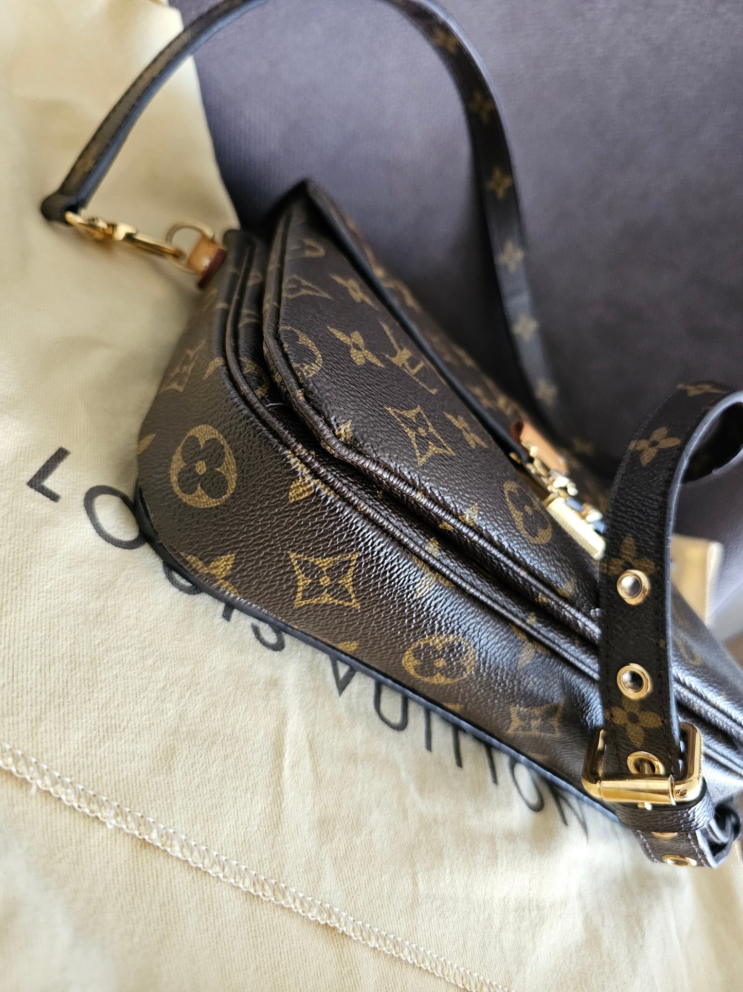 Louis Vuitton Pochette Métis monogram kanvas.