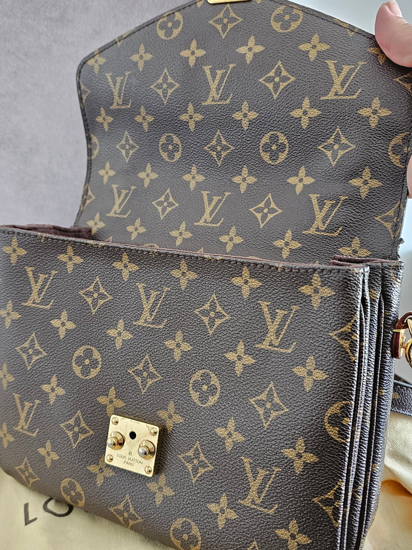 Louis Vuitton Pochette Métis monogram kanvas.