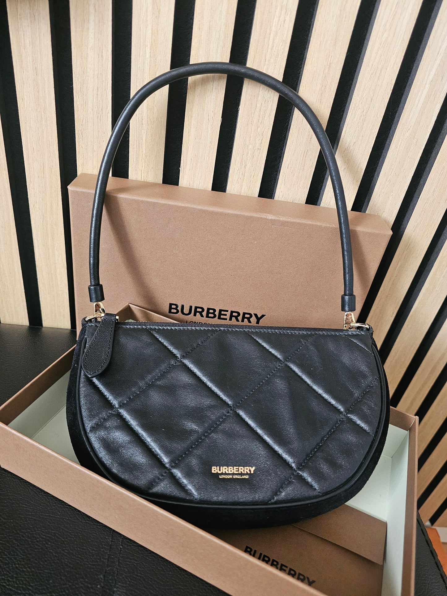 Burberry Olympia pouch/bag in black.
