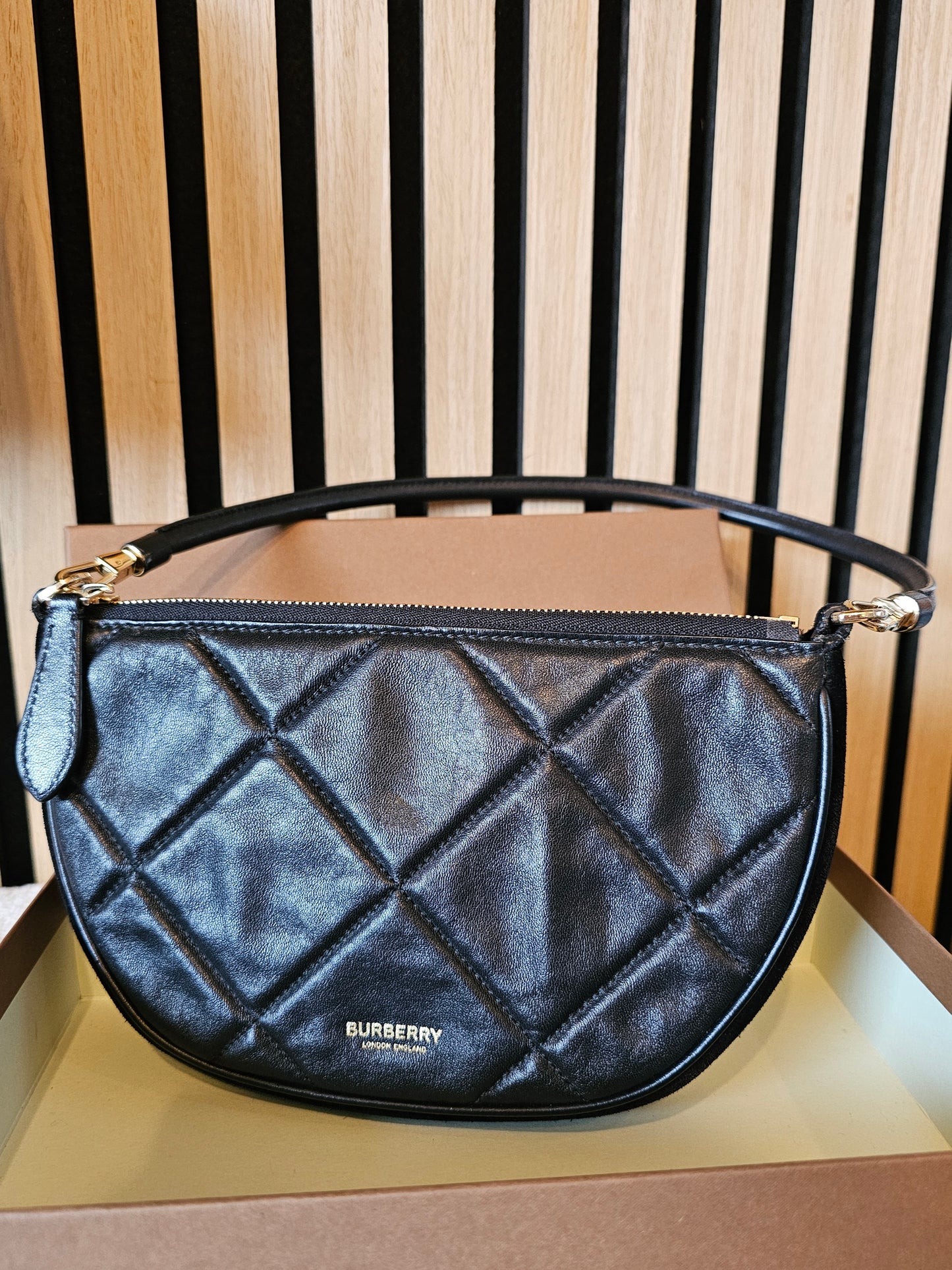 Burberry Olympia pouch/bag in black.