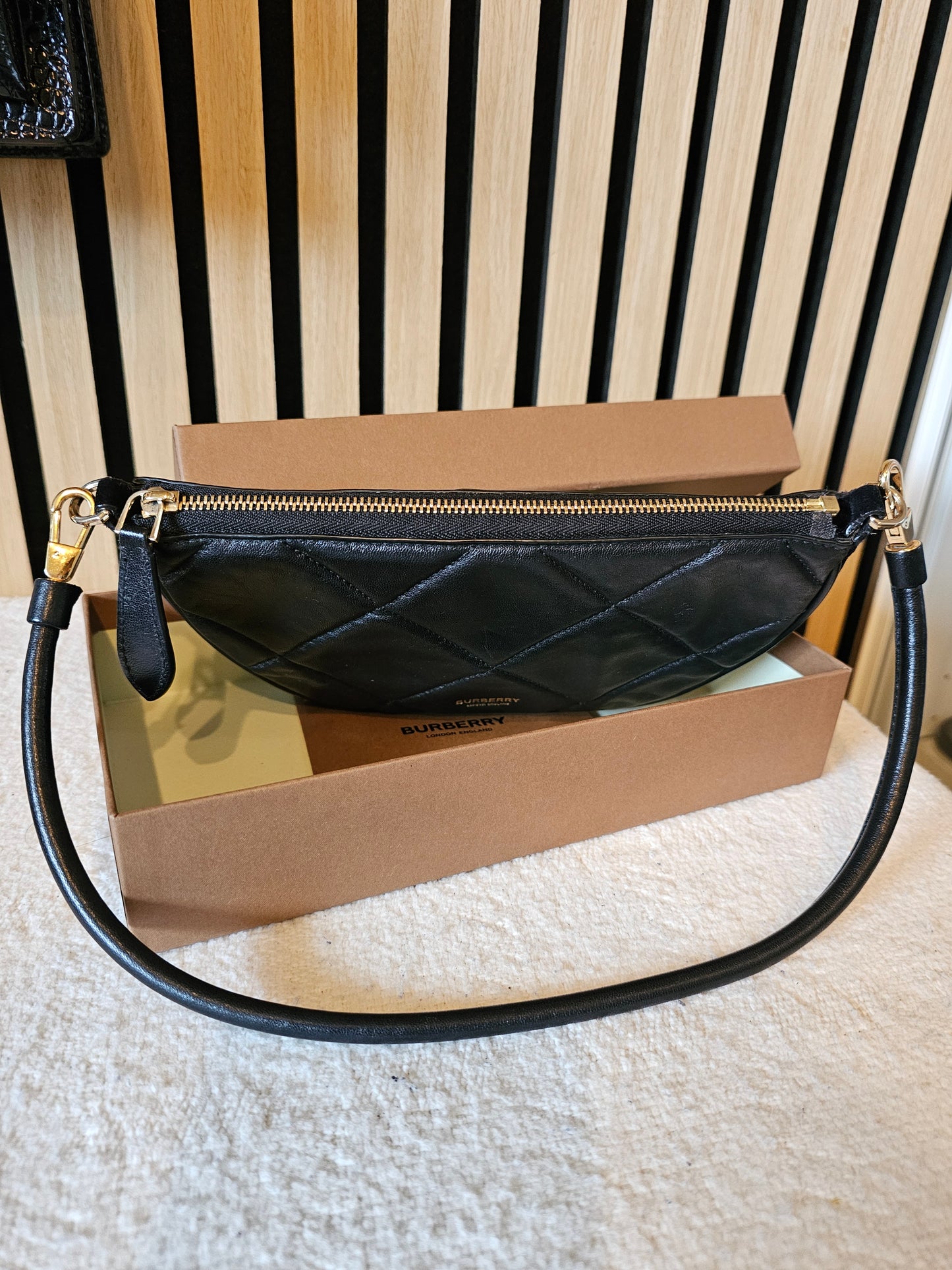 Burberry Olympia pouch/bag in black.