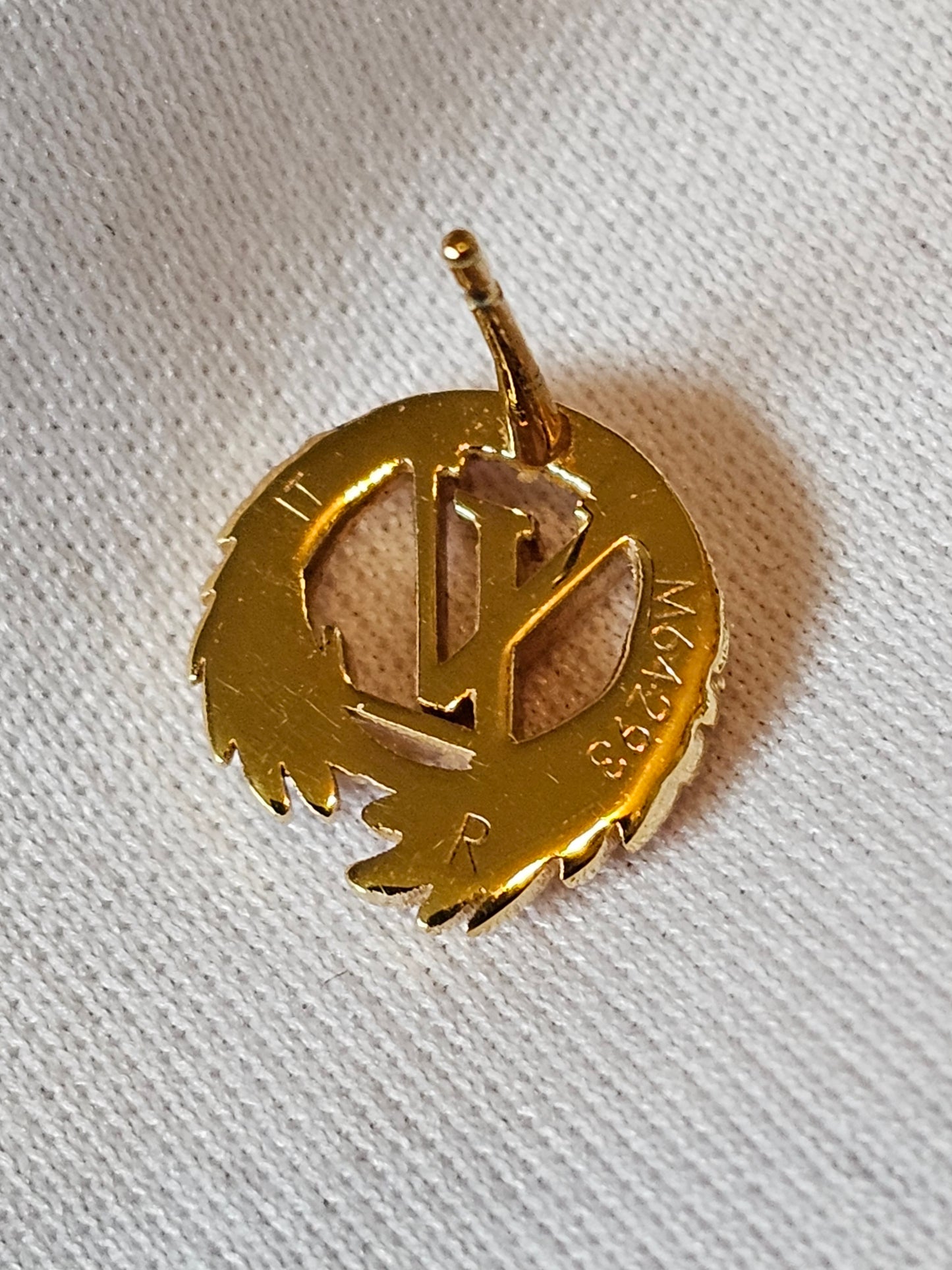 M64293 - Louis vuitton, LV angel golden earrings.