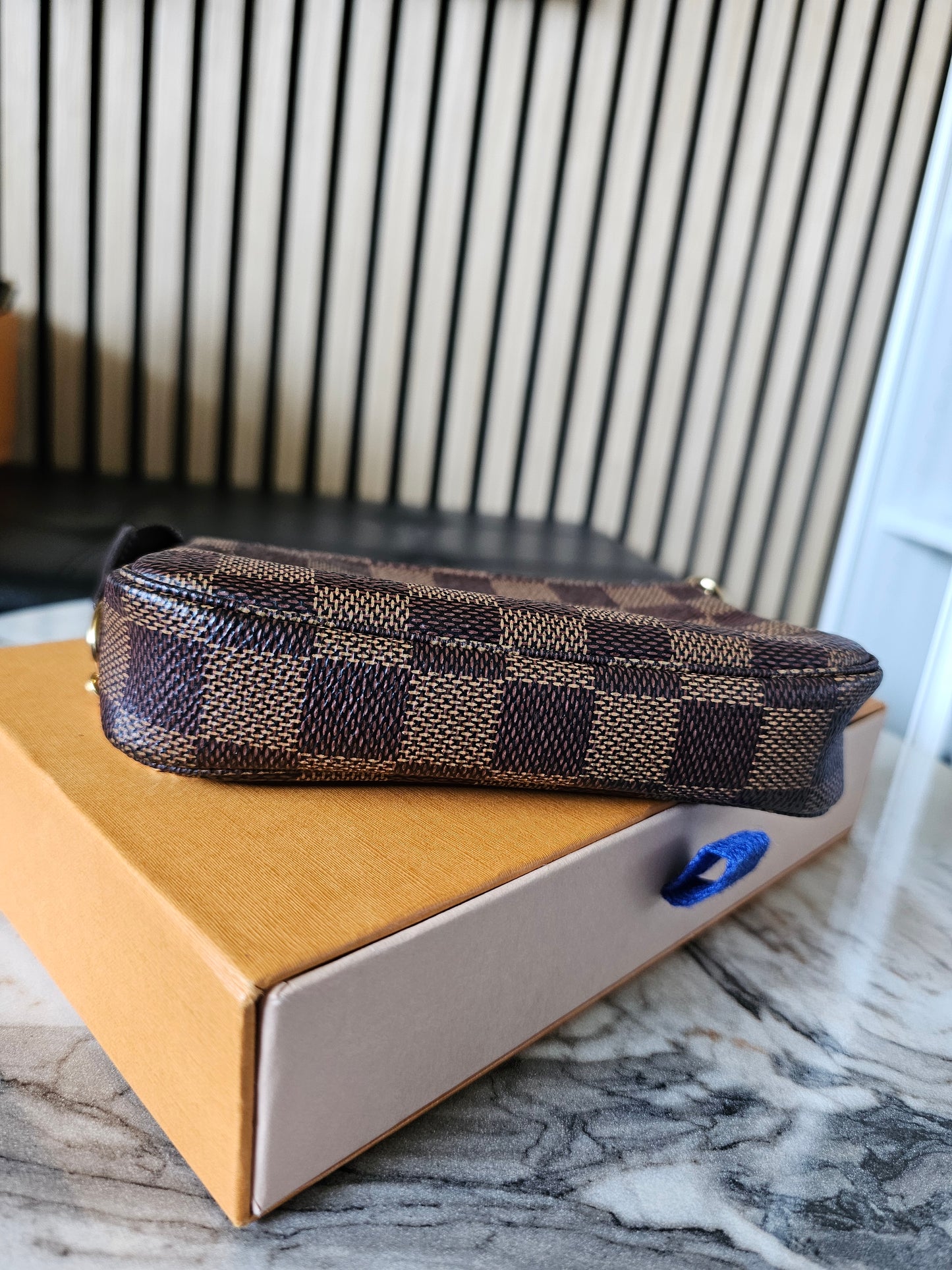 Louis Vuitton - mini pochette Acc. Damier ebene.
