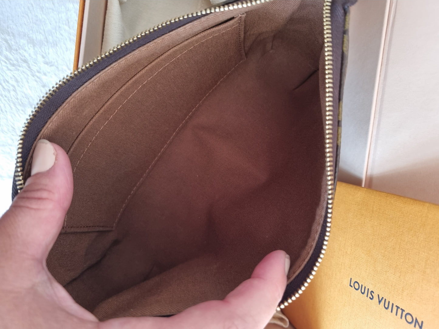 Louis vuitton pochette accesories NM I monogram kanvas.