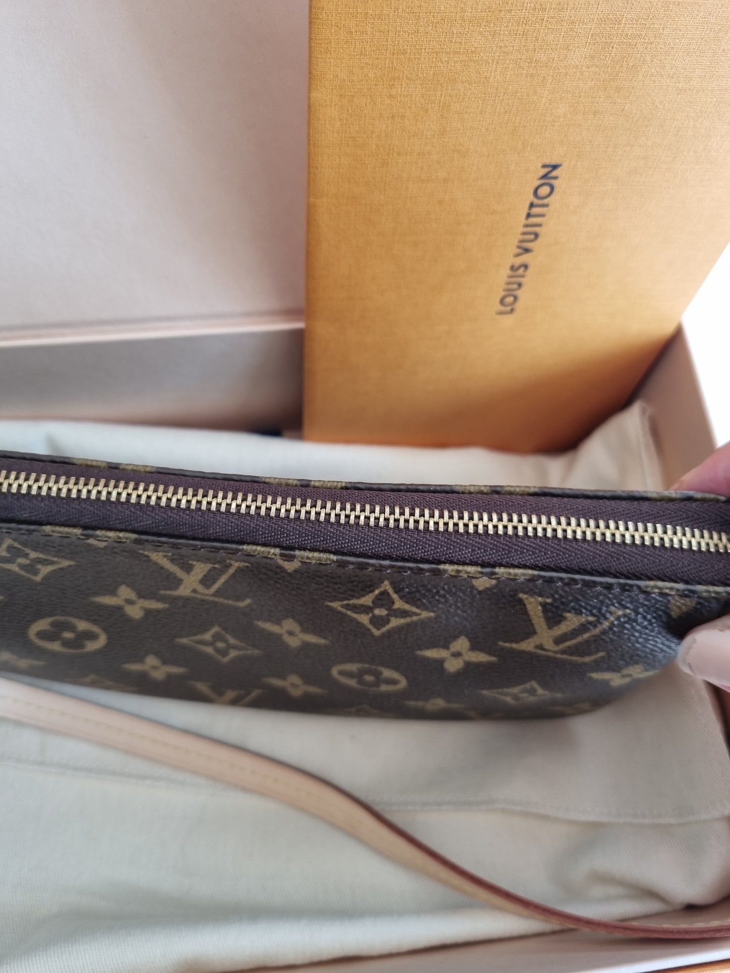 Louis vuitton pochette accesories NM I monogram kanvas.