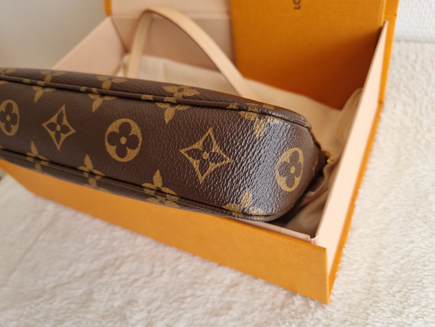 Louis vuitton pochette accesories NM I monogram kanvas.