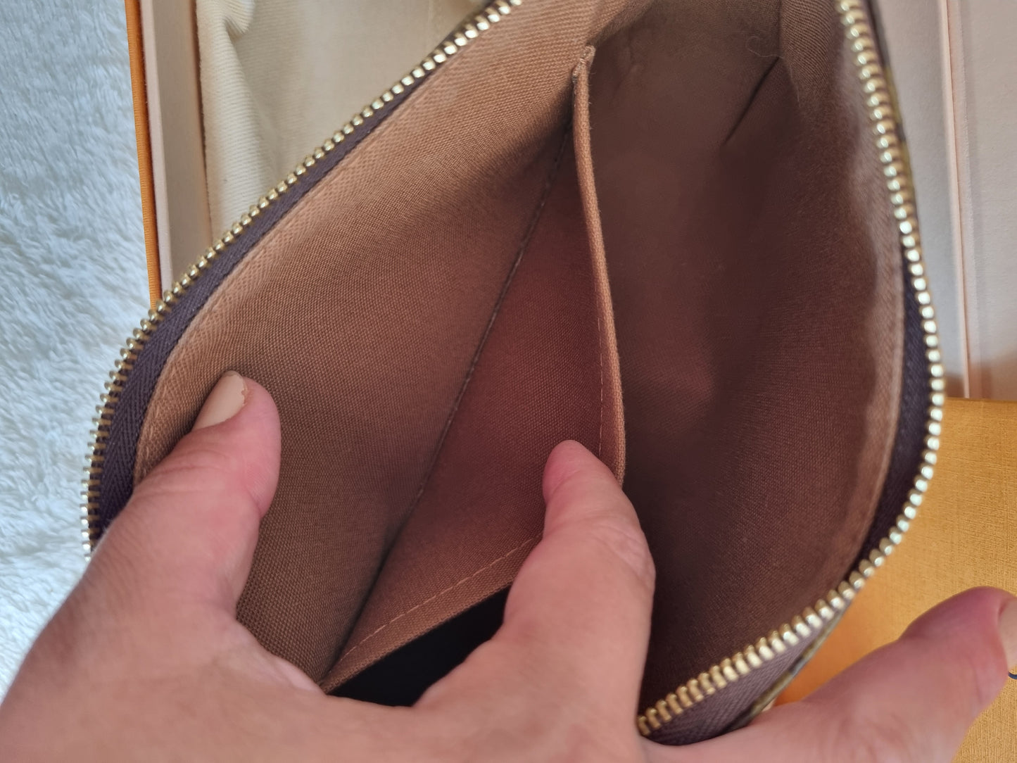 Louis vuitton pochette accesories NM I monogram kanvas.