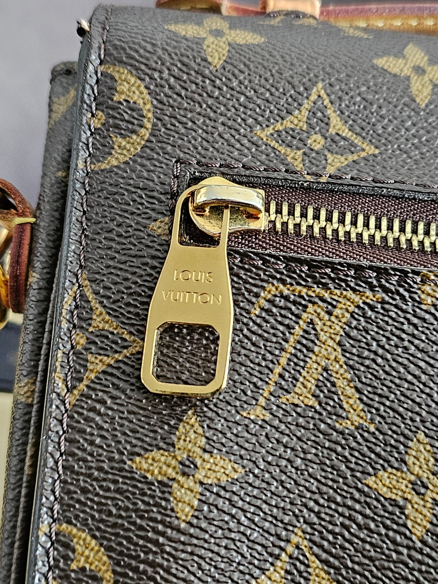 Louis Vuitton Pochette Métis monogram kanvas.