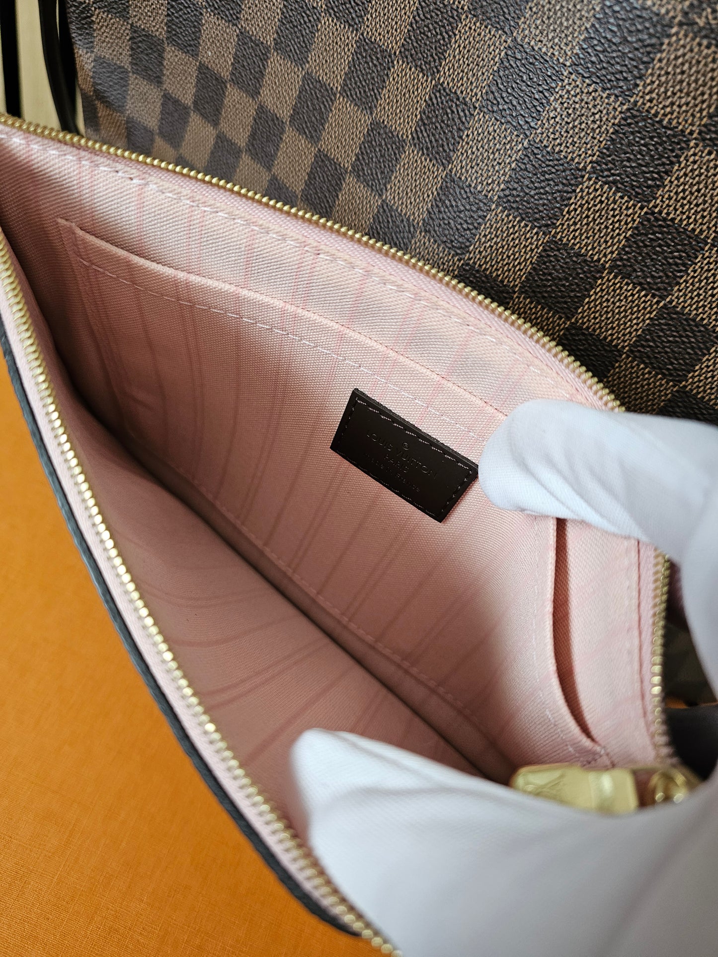 Louis Vuitton clutch I damier ebene - fra neverfull MM.