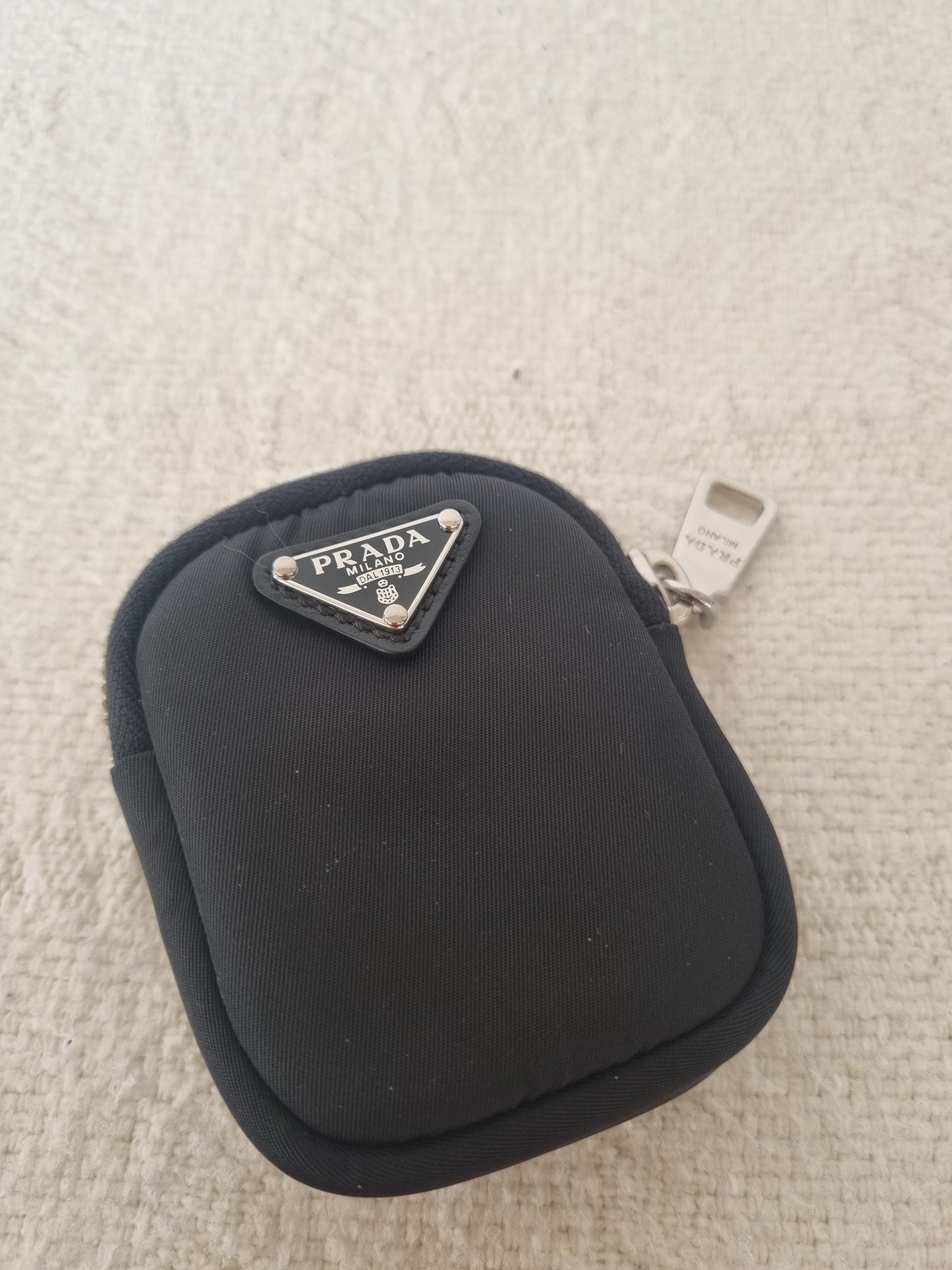 Prada pung - airpods case.
