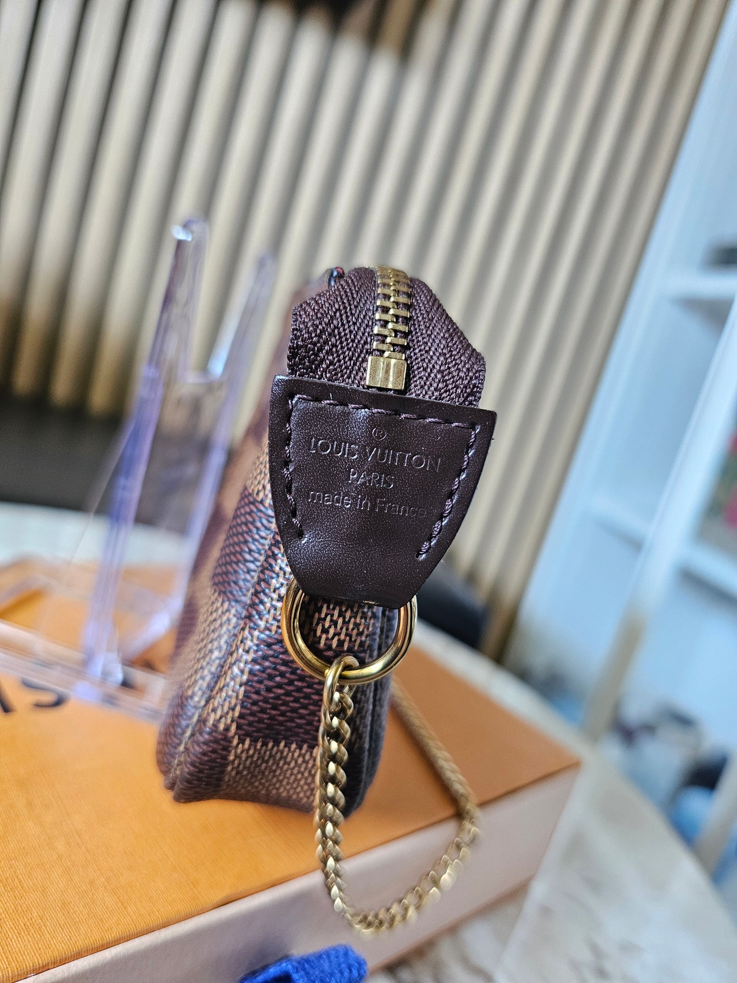 Louis Vuitton - mini pochette Acc. Damier ebene.