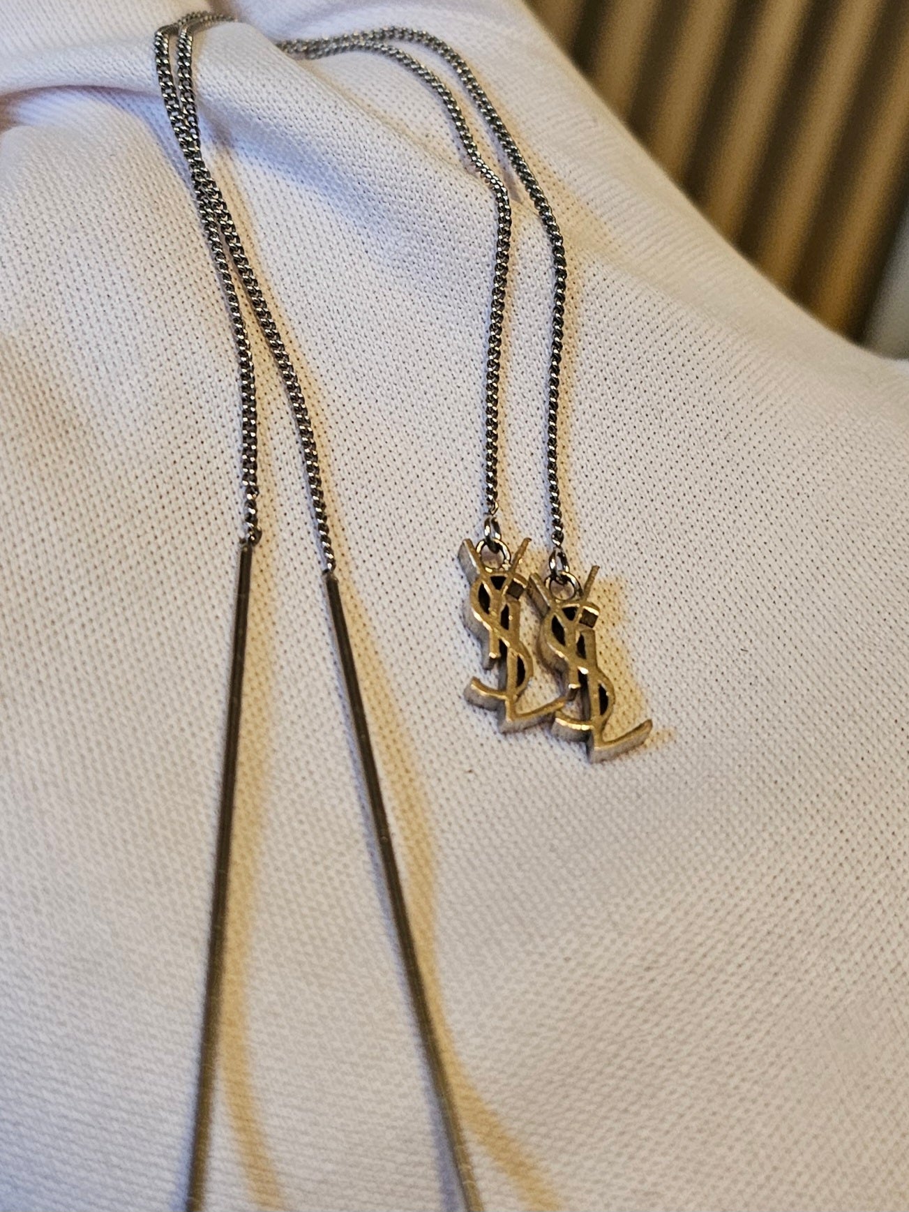 YSL Cassandre long earrings in silver.