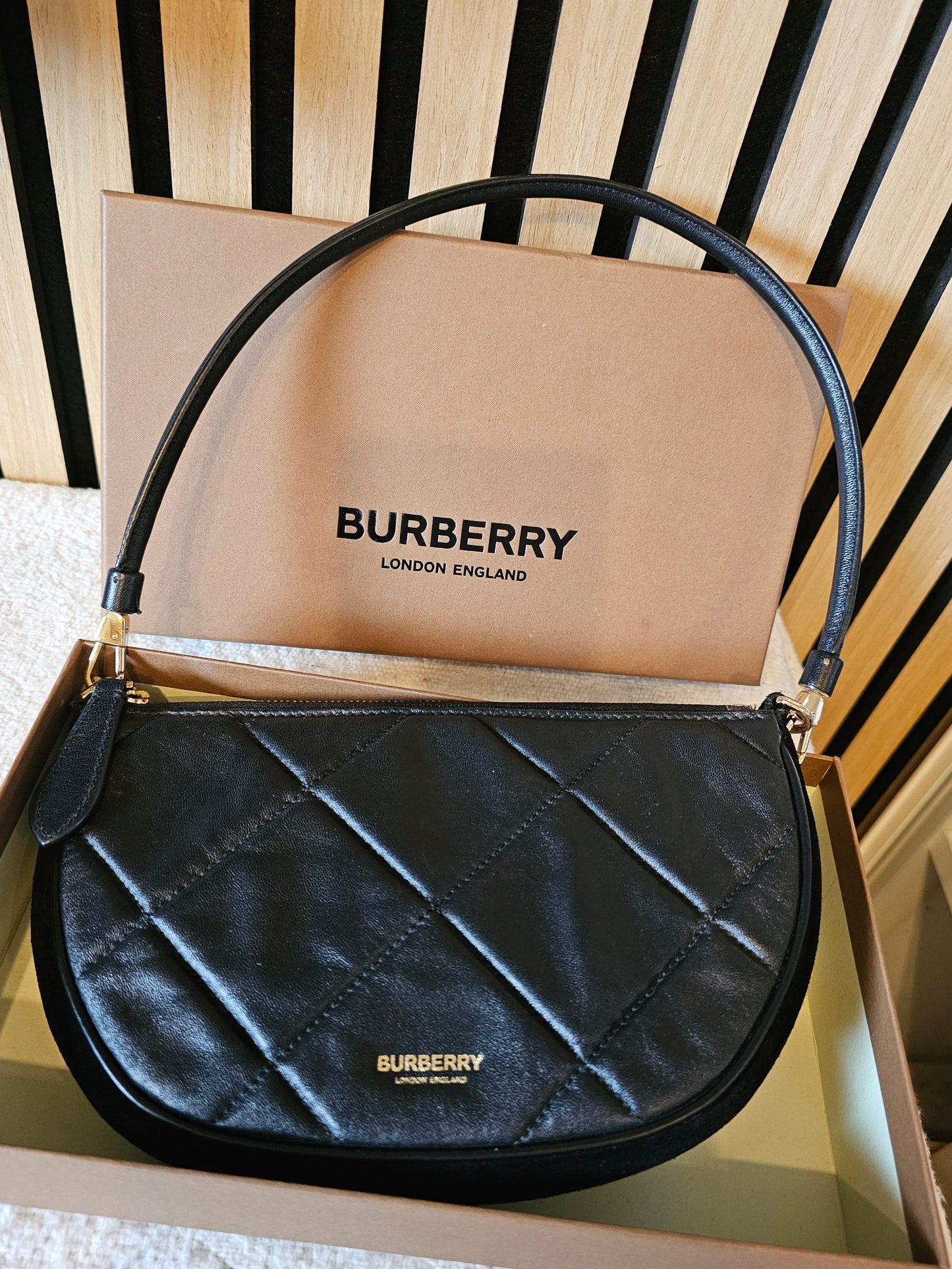 Burberry Olympia pouch/bag in black.