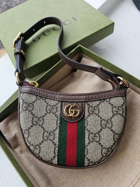 746055- Gucci GG mini ophidia clutch.