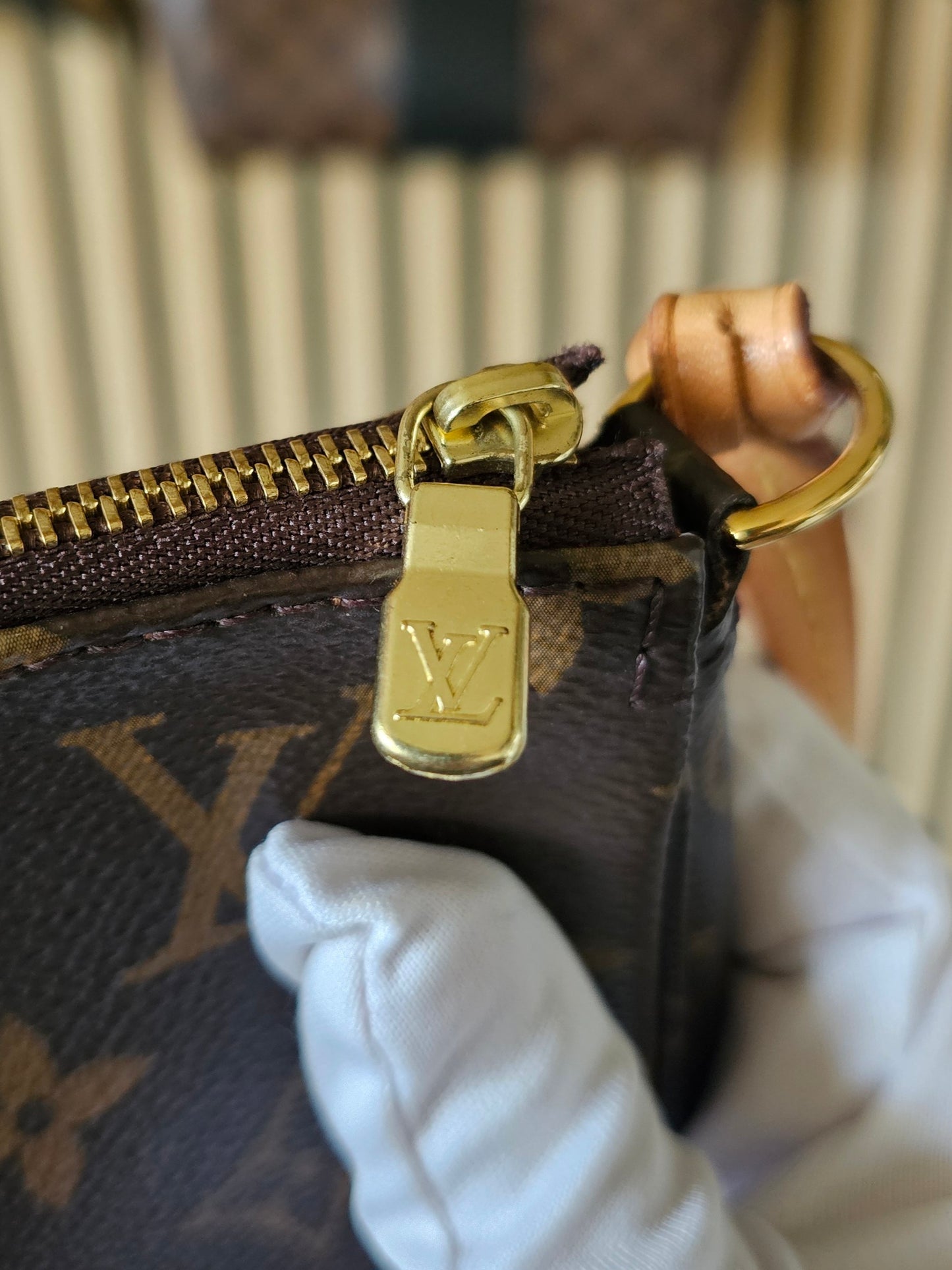 Pochette accesories NM in monogram kanvas.