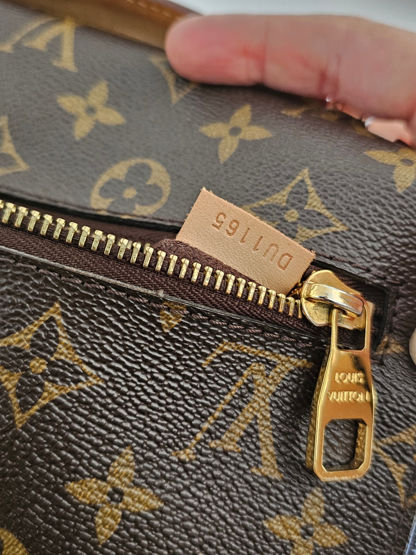 Louis Vuitton Pochette Métis monogram kanvas.