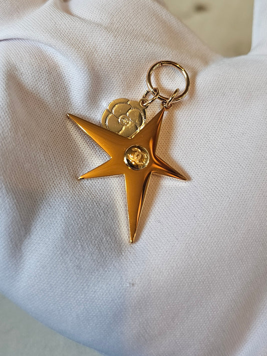 Chanel small bagcharm golden star.