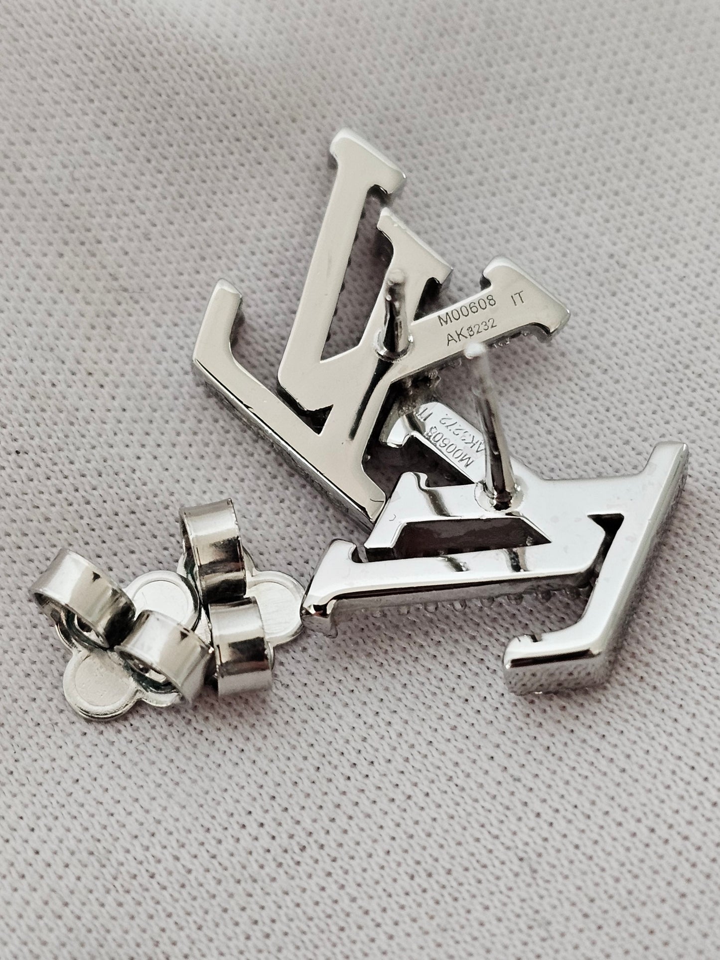 Louis Vuitton iconic LV earrings, silver/palladium with stones.