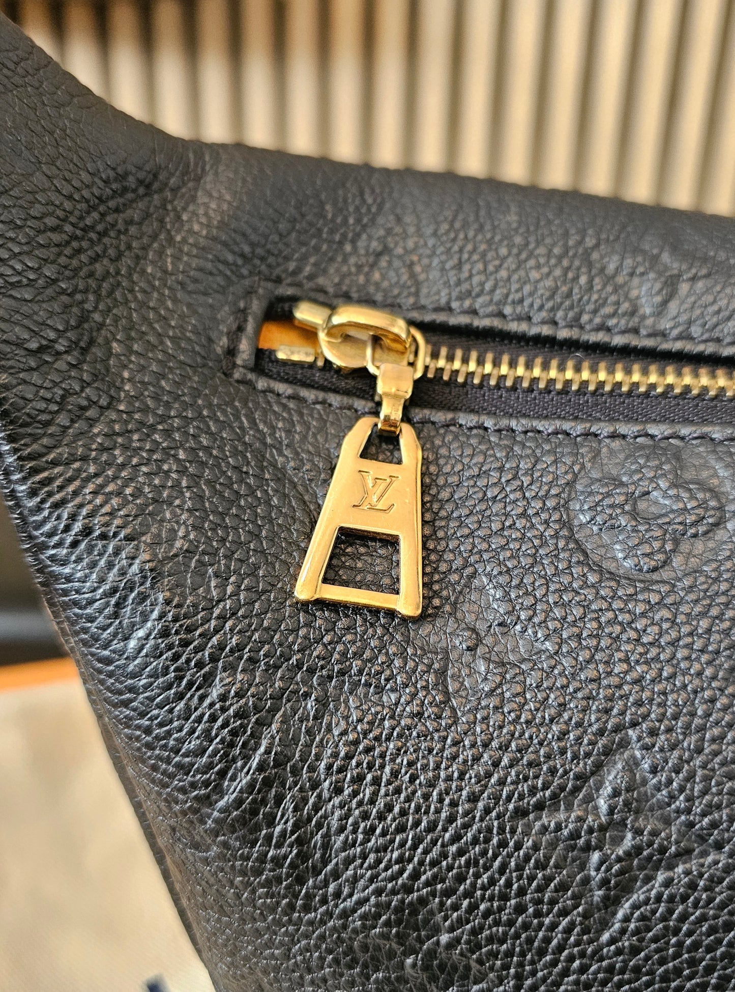 M44812 - Louis Vuitton Bumbag, MNG. Black empreinte leather.
