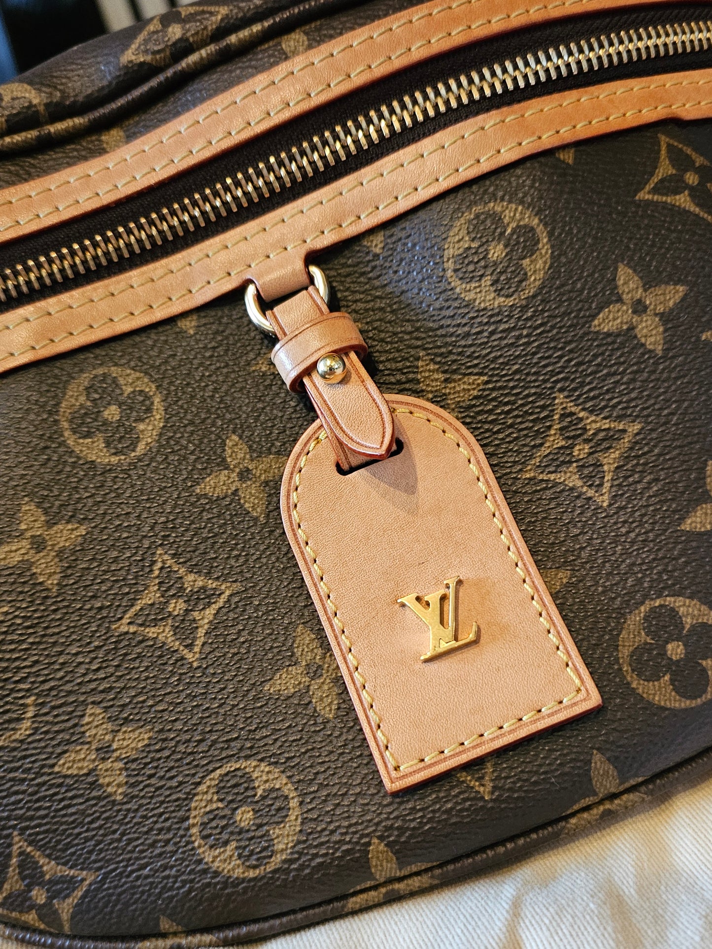 M46784 - Louis Vuitton bumbag, High Rise in Monogram kanvas.