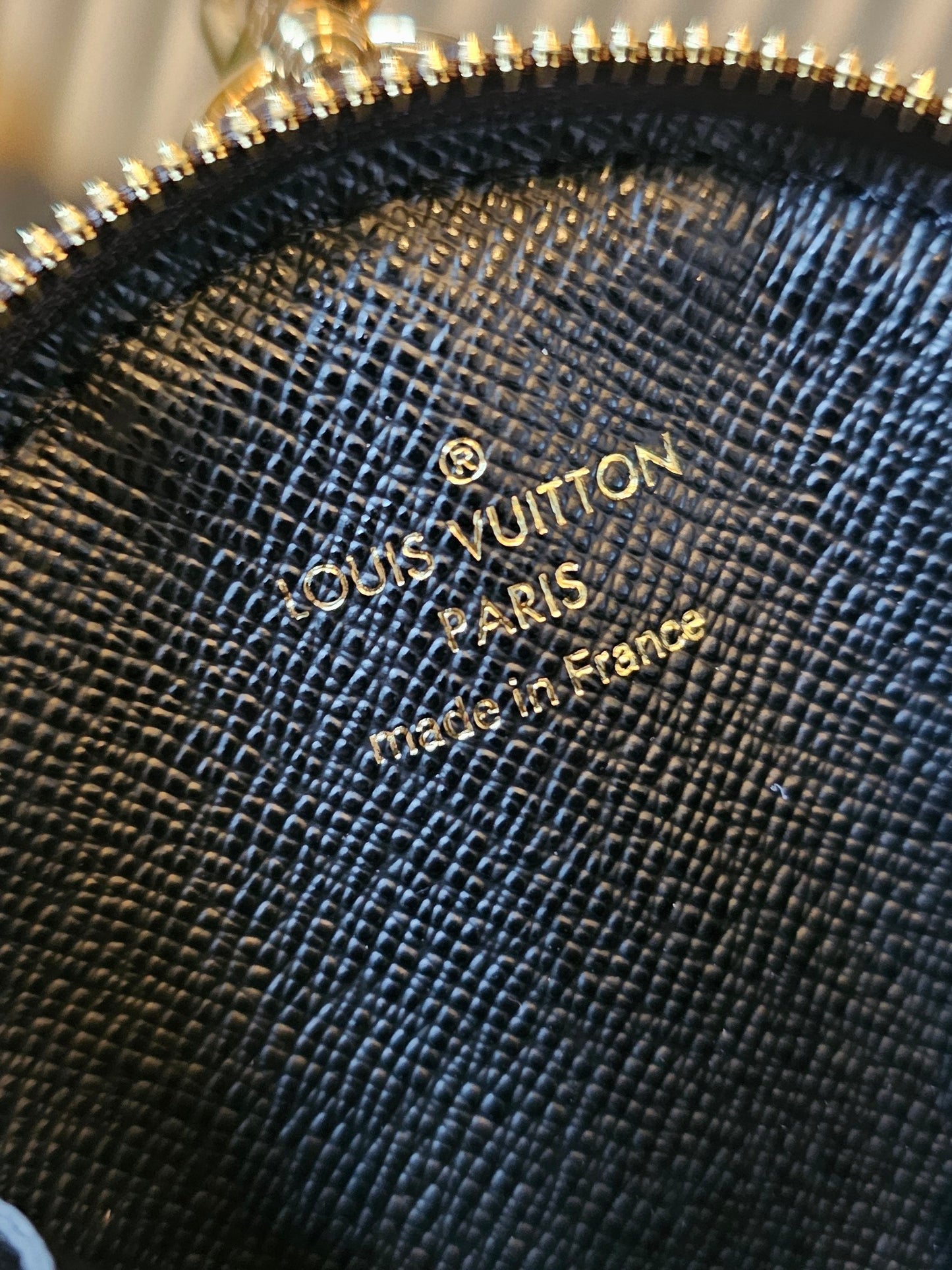 Louis vuitton rund møntpung i monogram kanvas.