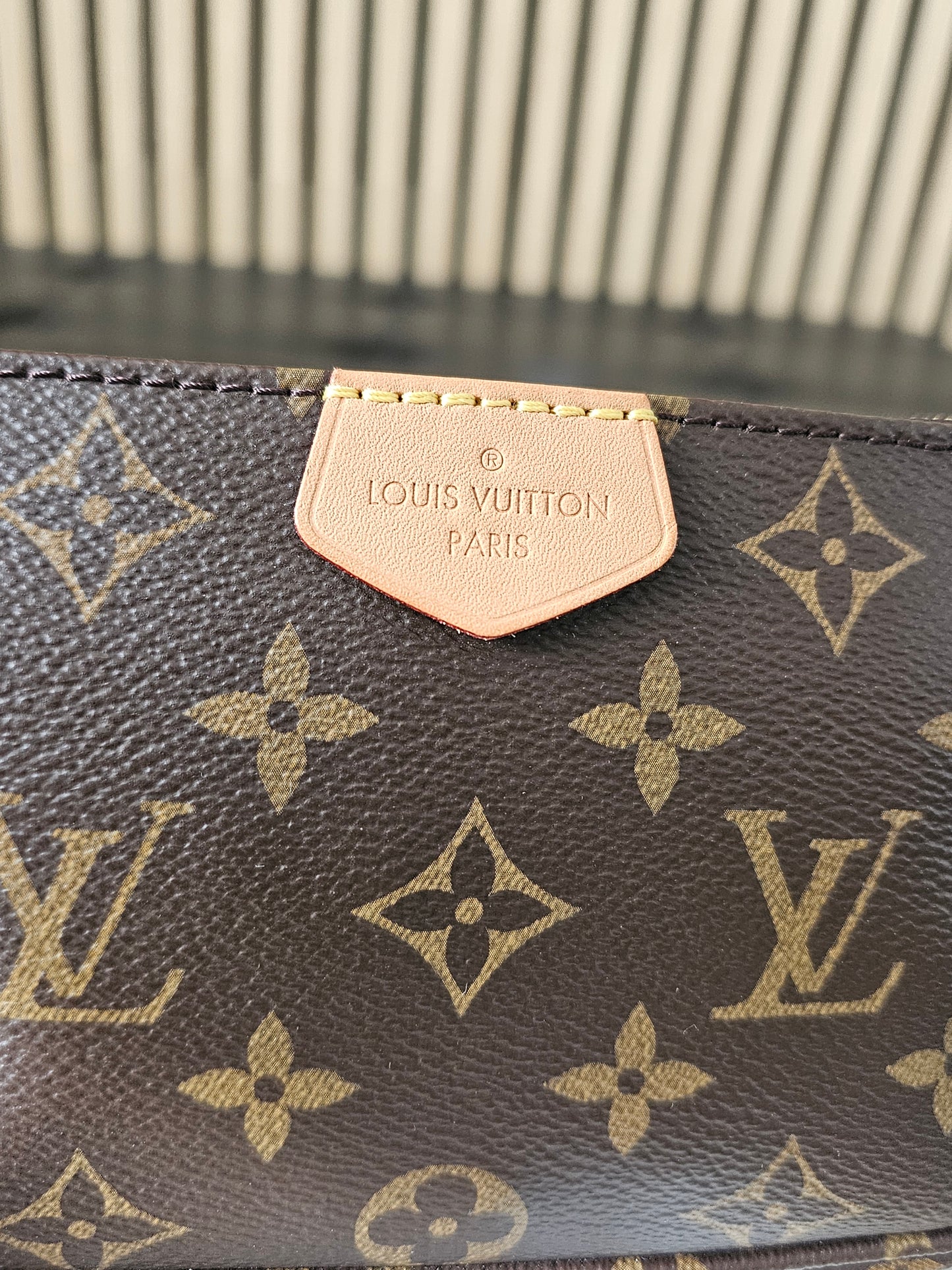 Louis Vuitton small pochette with chain, MNG kanvas.