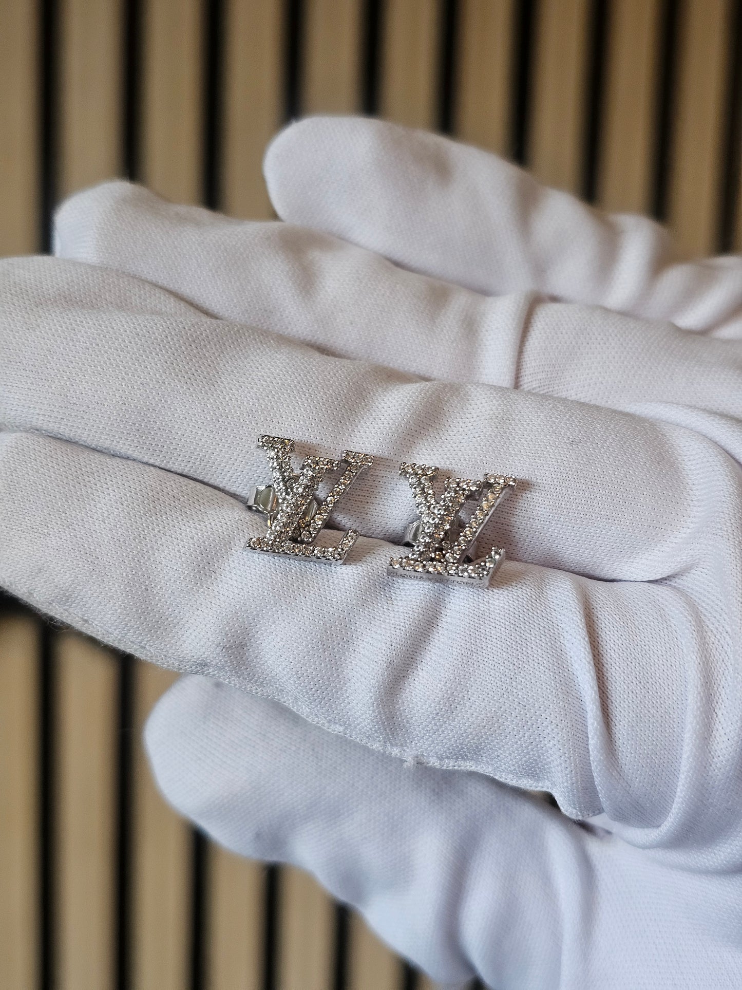 Louis Vuitton iconic LV earrings, silver/palladium with stones.