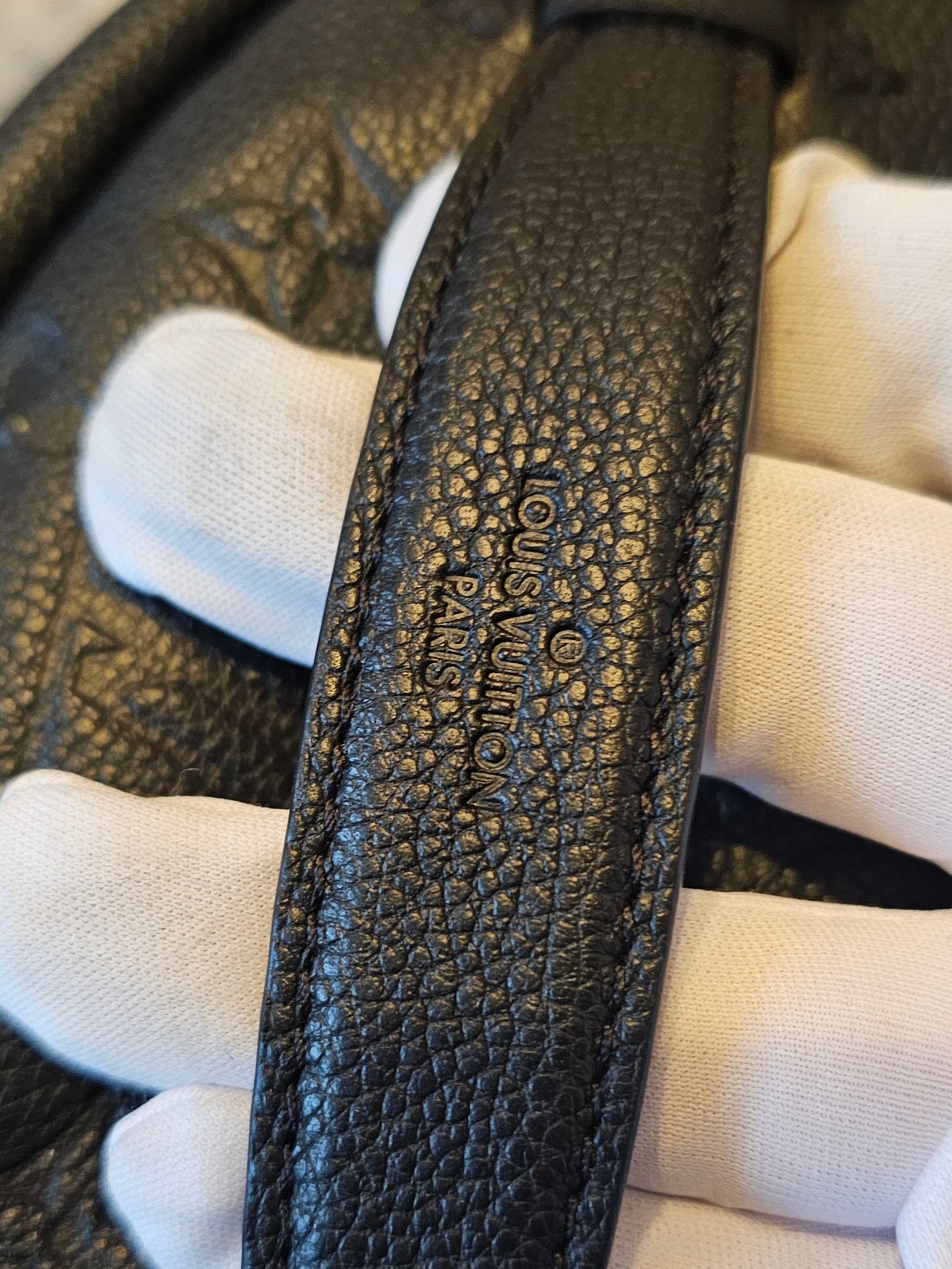 M44812- Louis Vuitton Bumbag in Monogram, black empreinte leather.