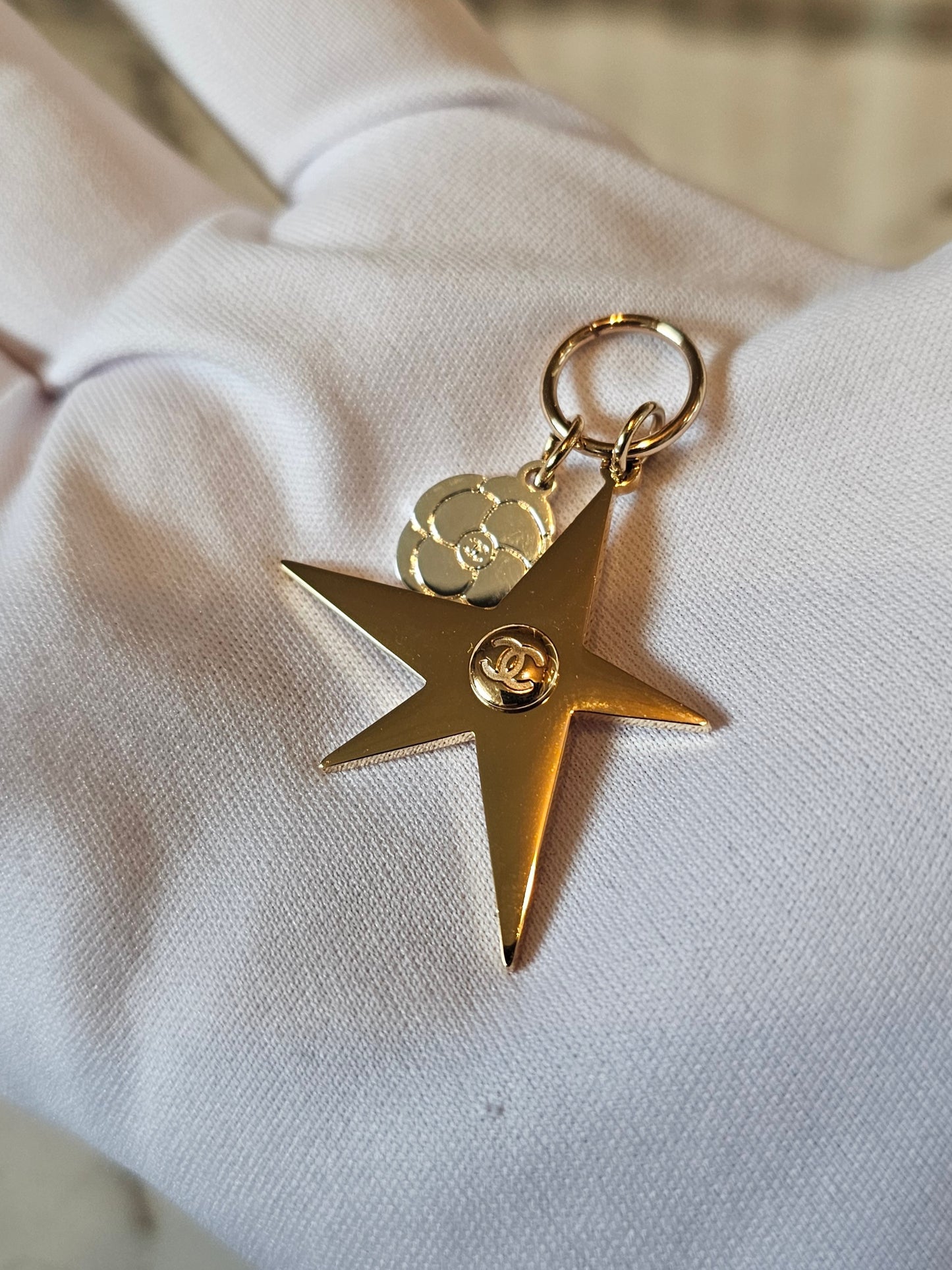 Chanel small bagcharm golden star.