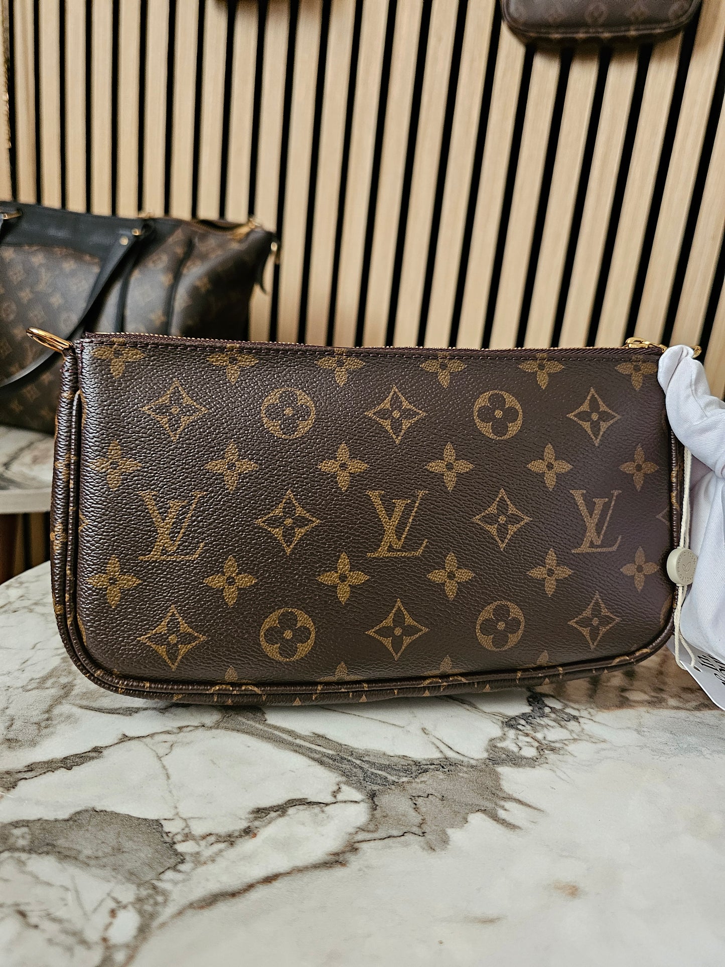 Louis Vuitton pochette accesories, monogram kanvas.