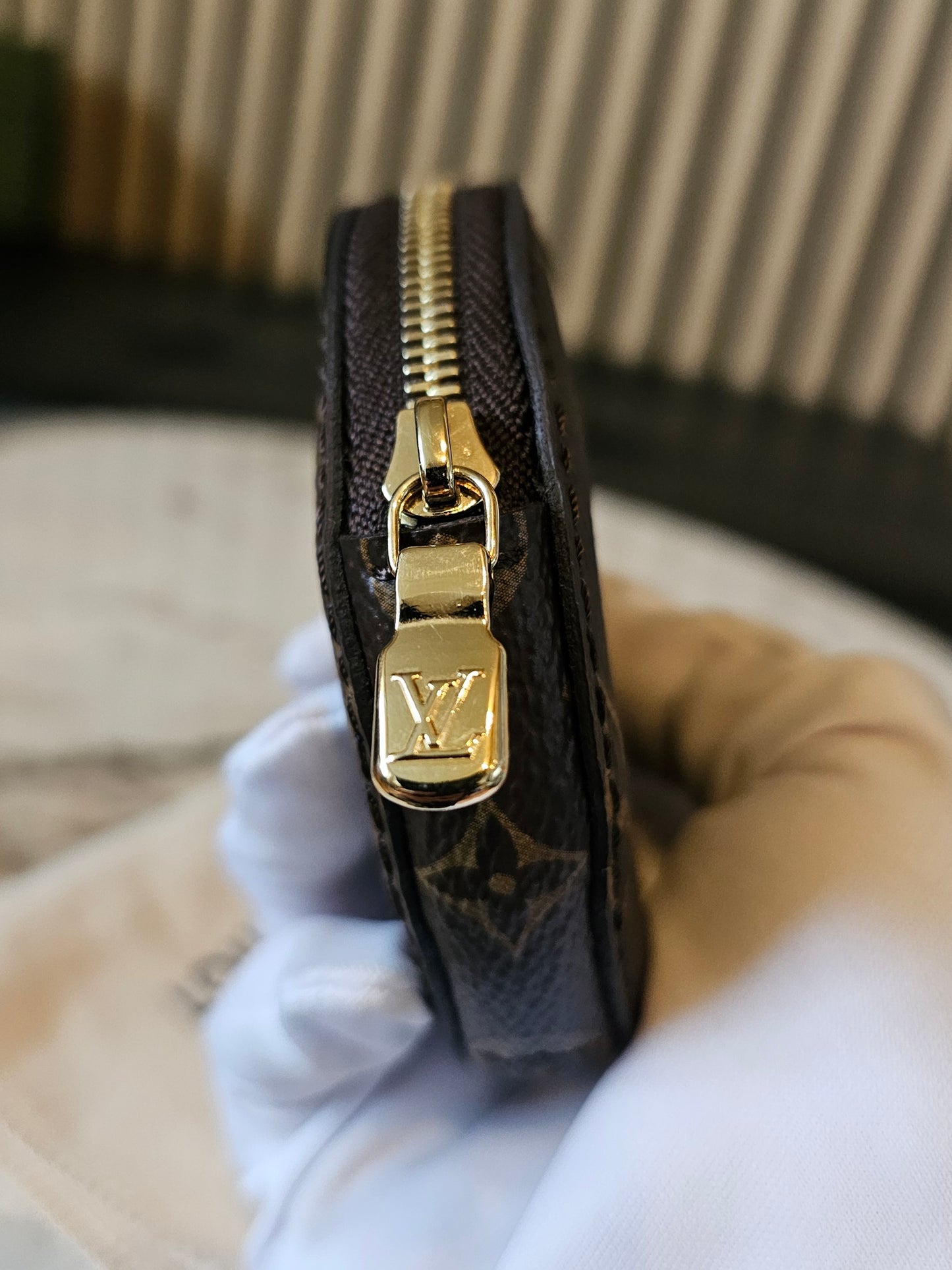 Louis vuitton rund møntpung i monogram kanvas.