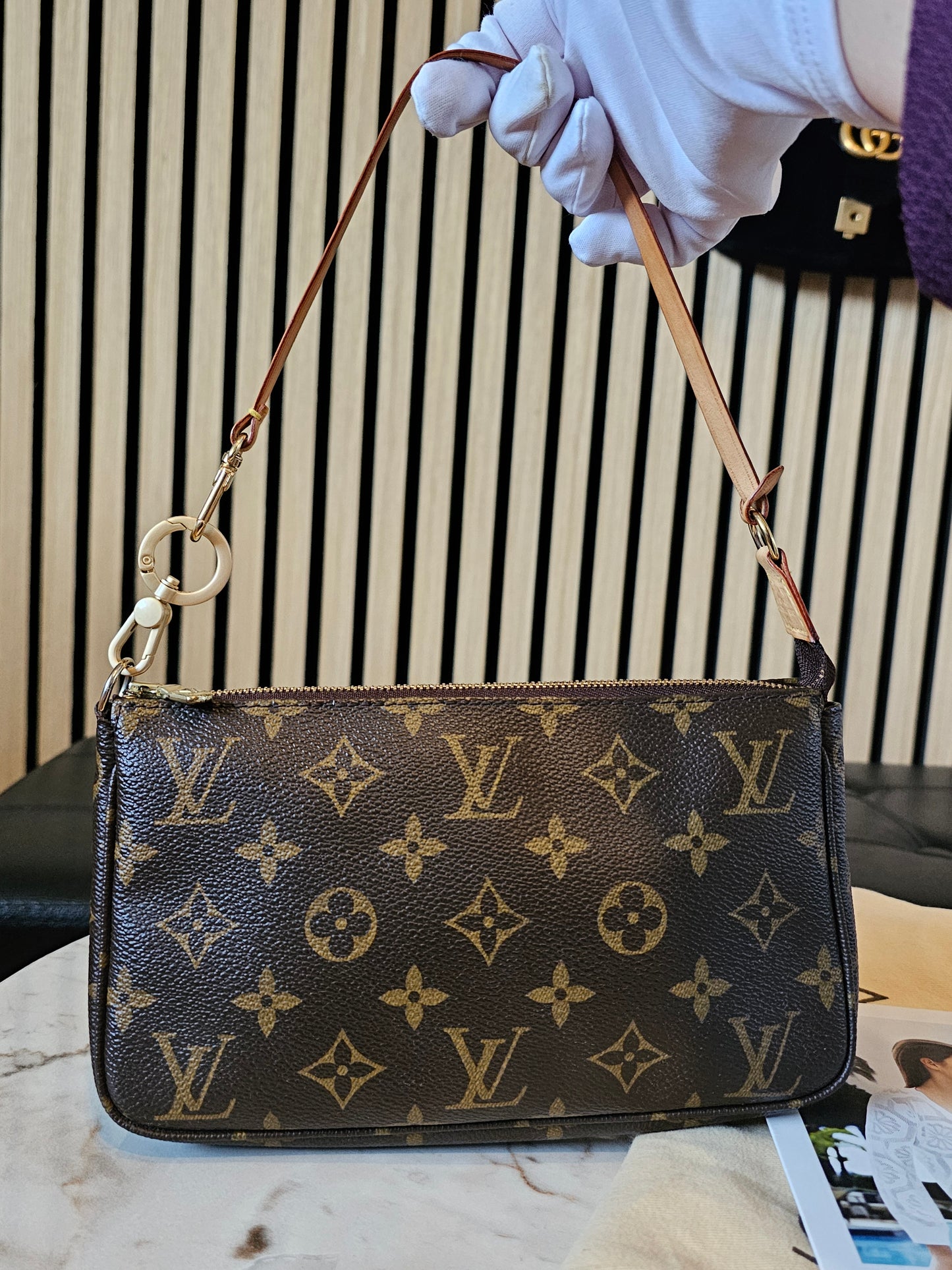 Louis Vuitton pochette accesories in monogram kanvas.