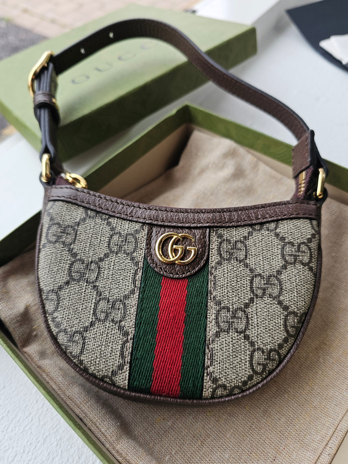 746055- Gucci GG mini ophidia clutch.