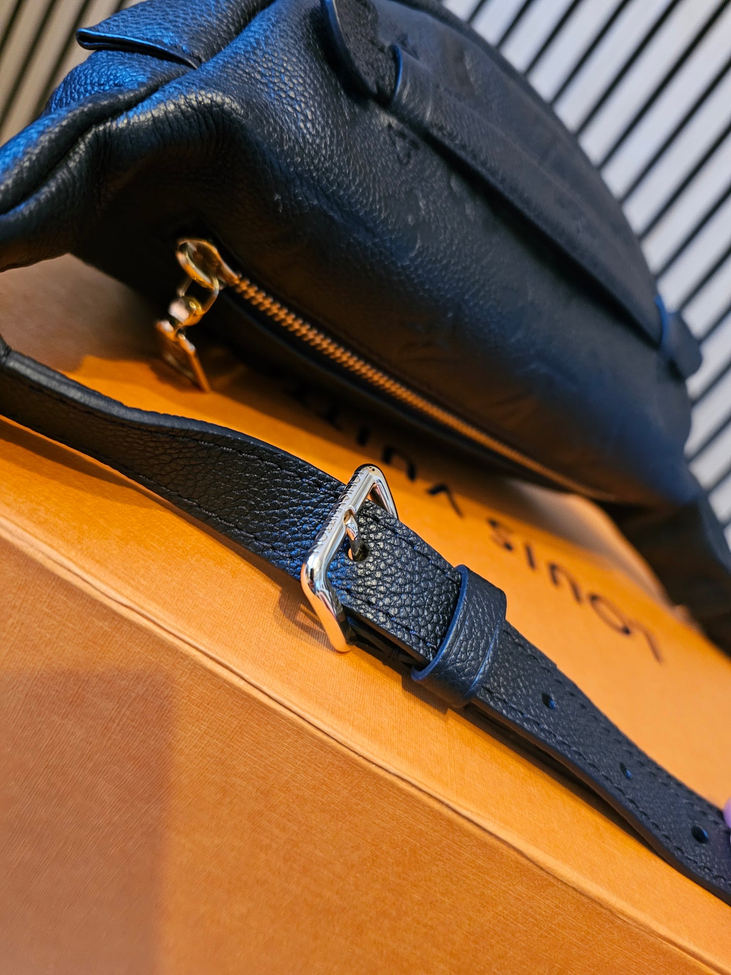 M44812- Louis Vuitton Bumbag in Monogram, black empreinte leather.