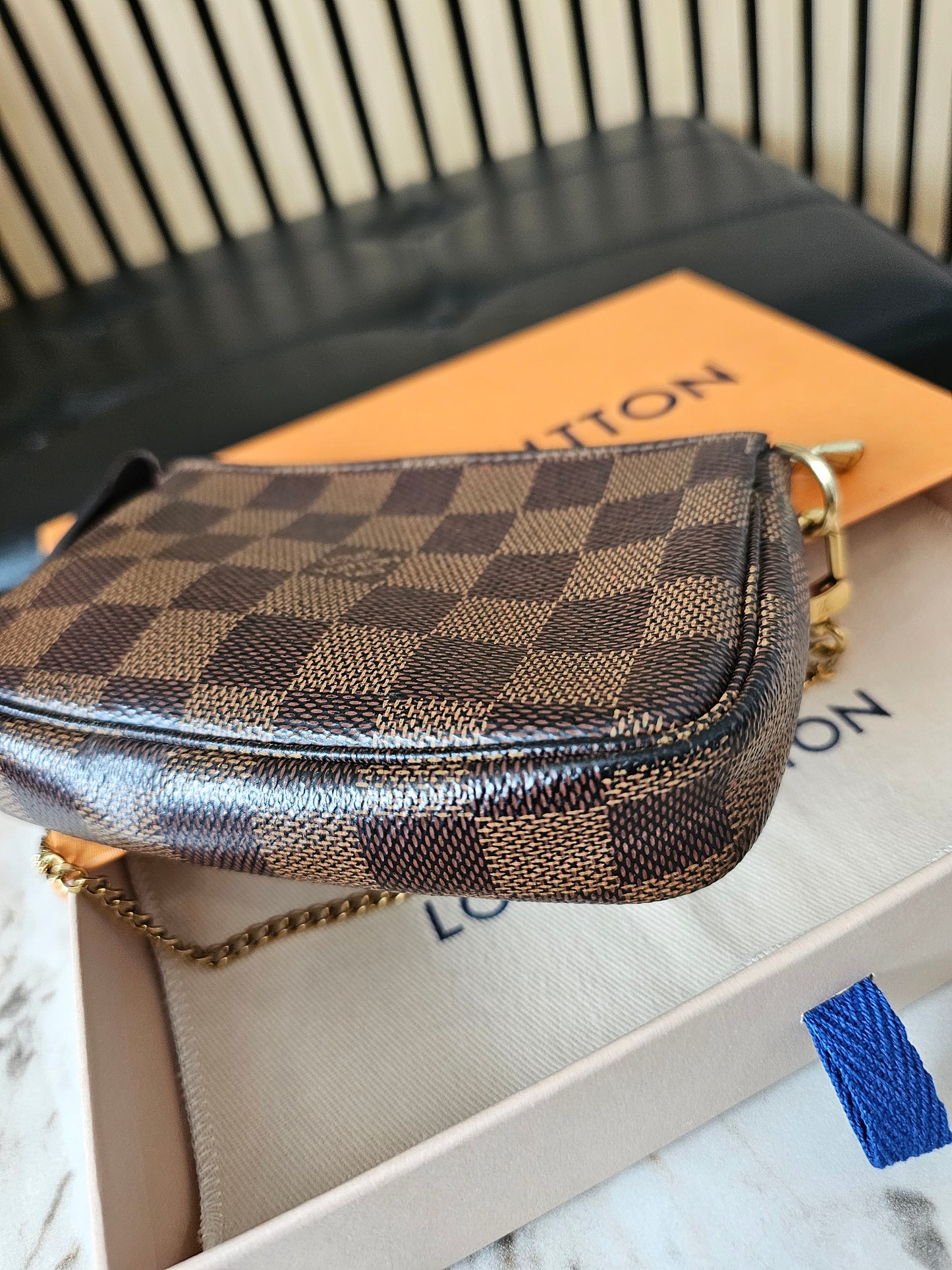 N58009 - Louis Vuitton mini pochette acc. Damier ebene.