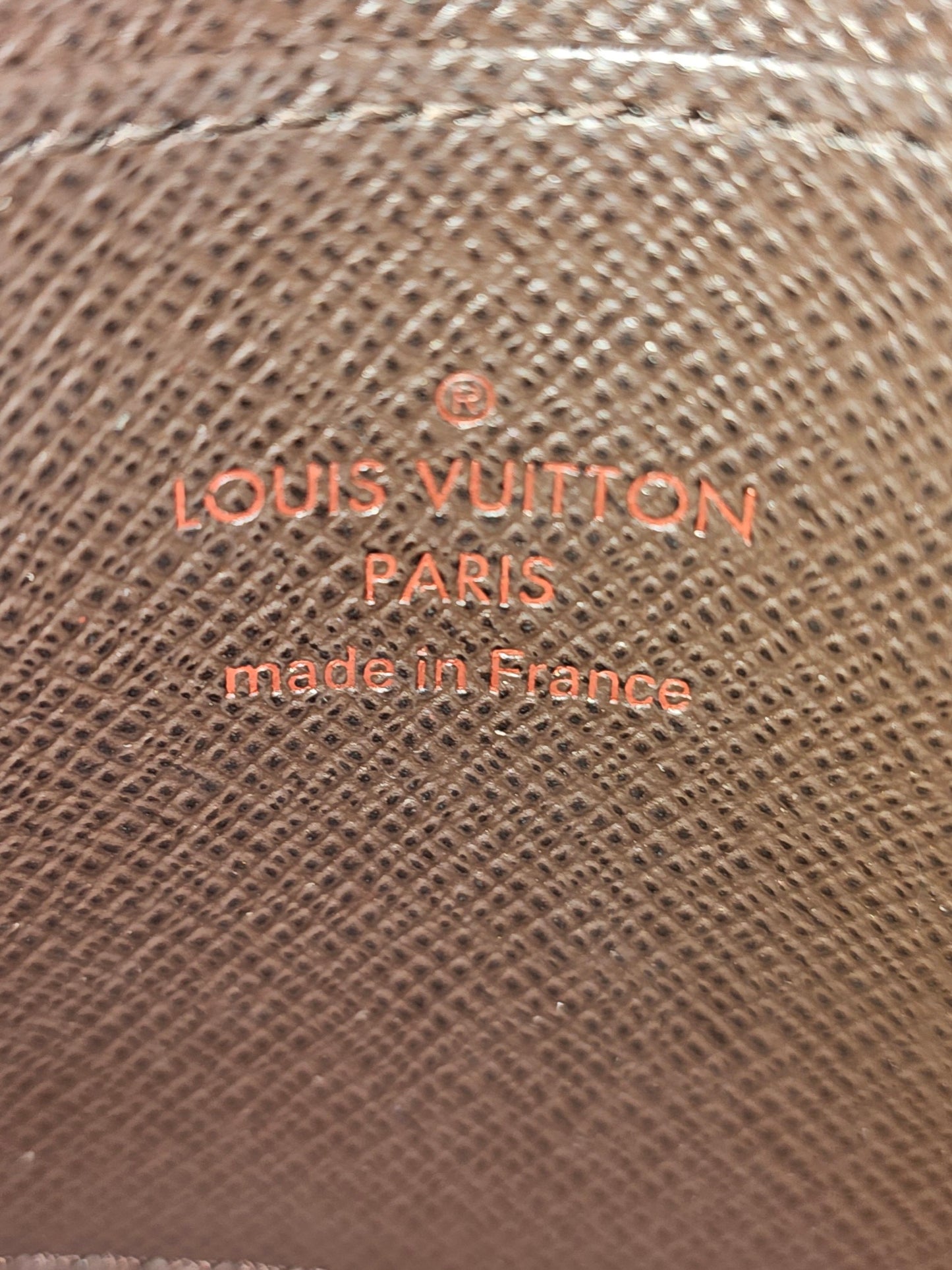 N63070- Louis Vuitton Zippy coin purse i damier ebene.