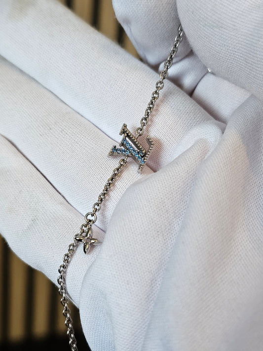 M0941A - Louis Vuitton, LV iconic bracelet, silver with blue stones.