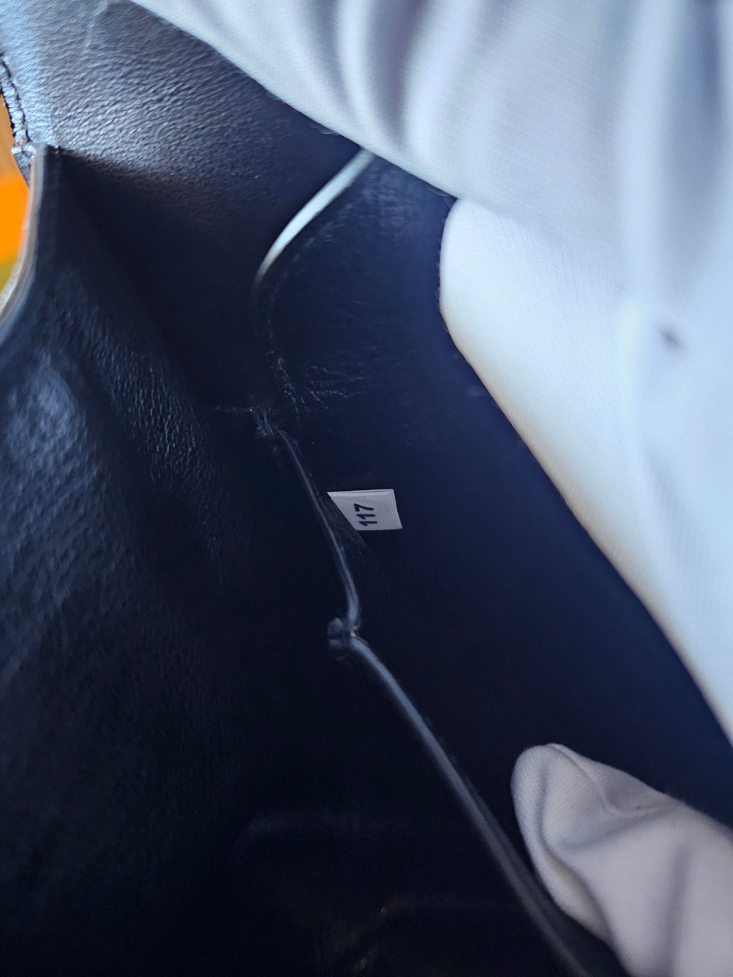 Prada Cahier bag animalier, black saffiano leather.