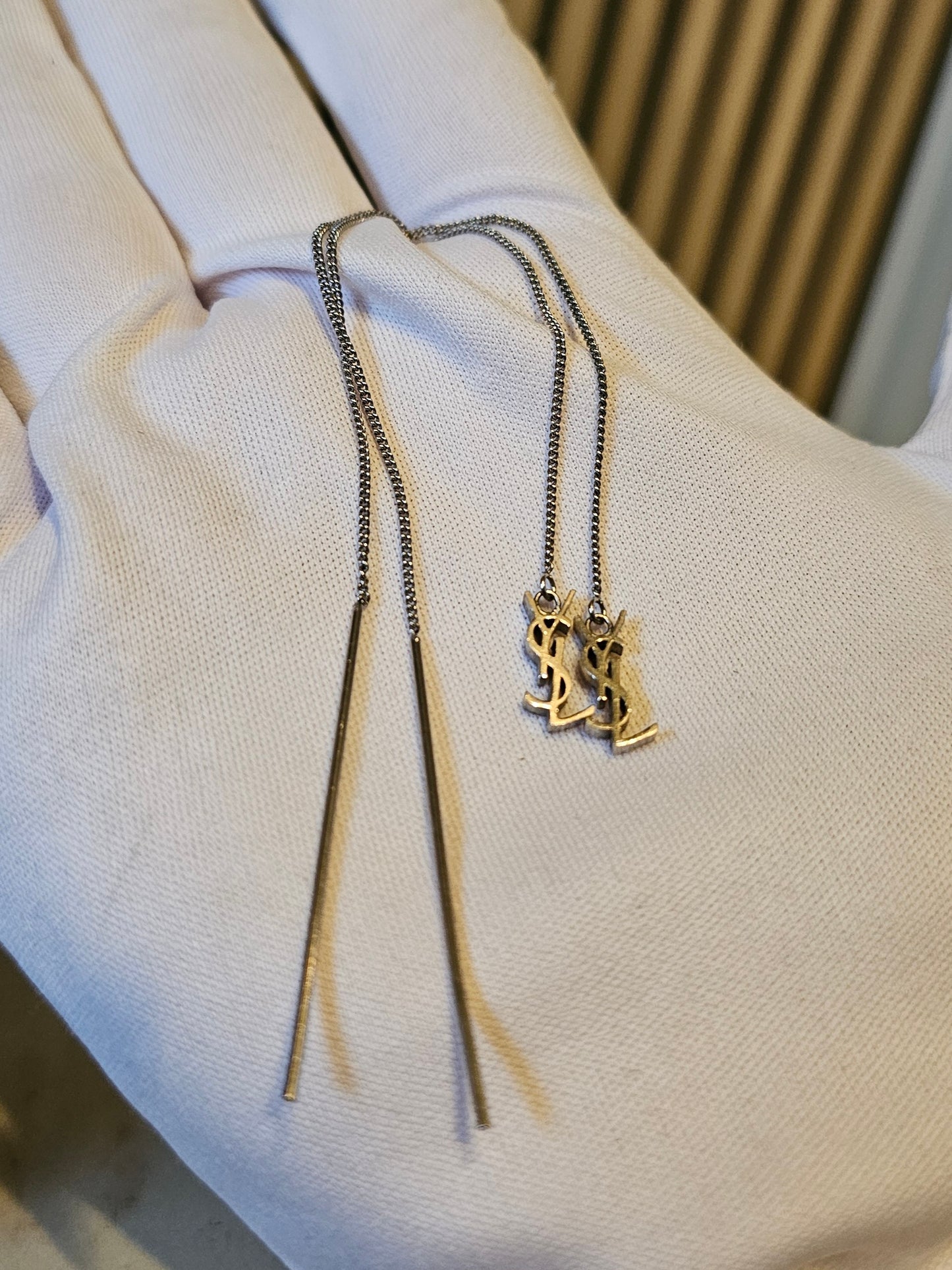 YSL Cassandre long earrings in silver.