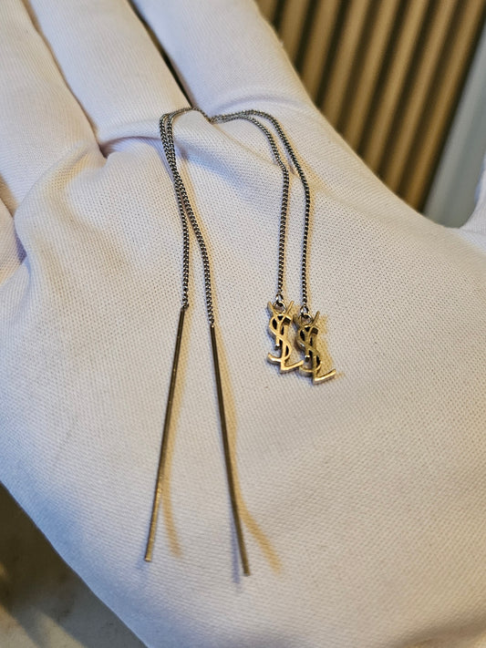 YSL Cassandre long earrings in silver.