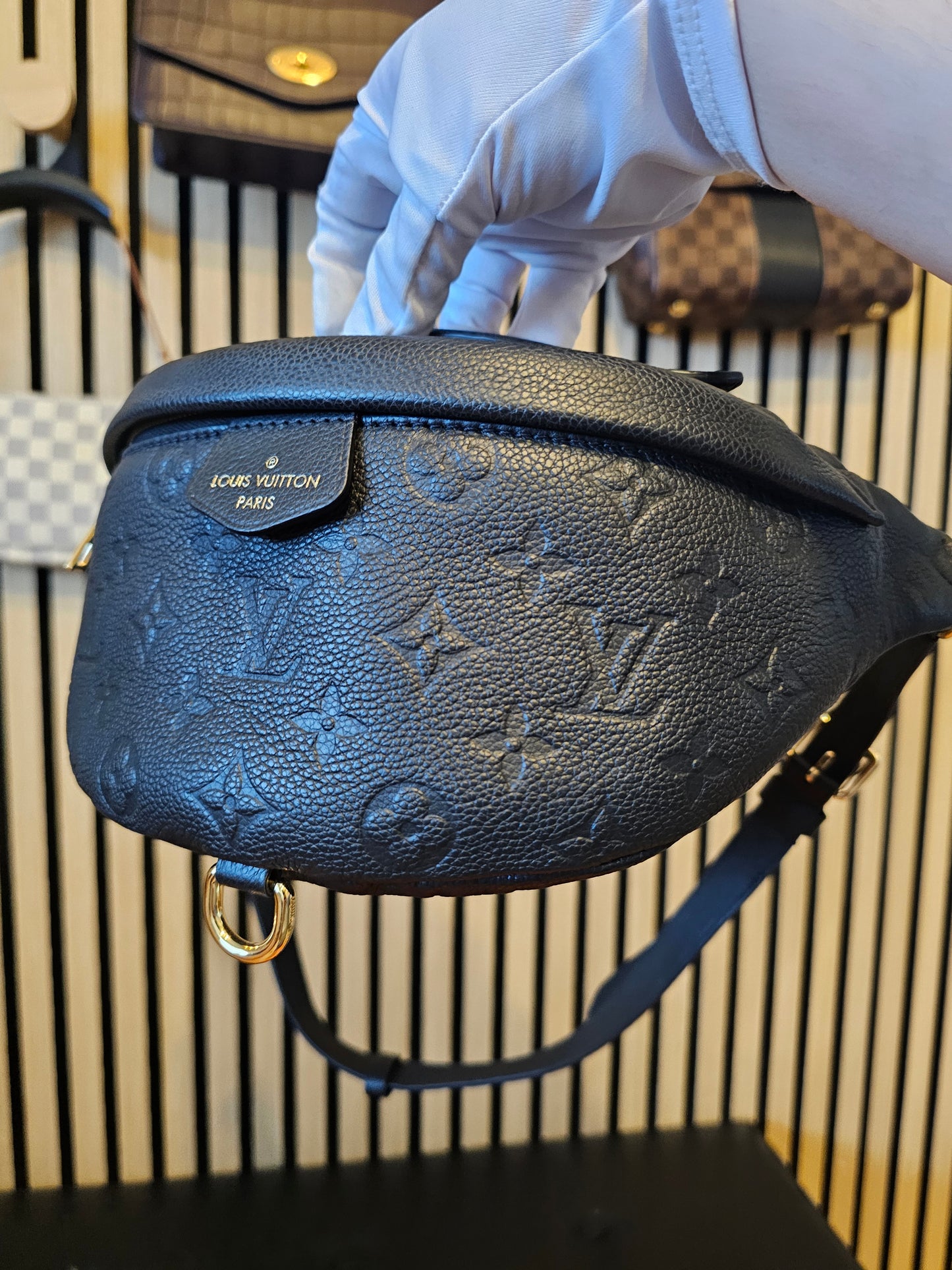 M44812- Louis Vuitton Bumbag in Monogram, black empreinte leather.