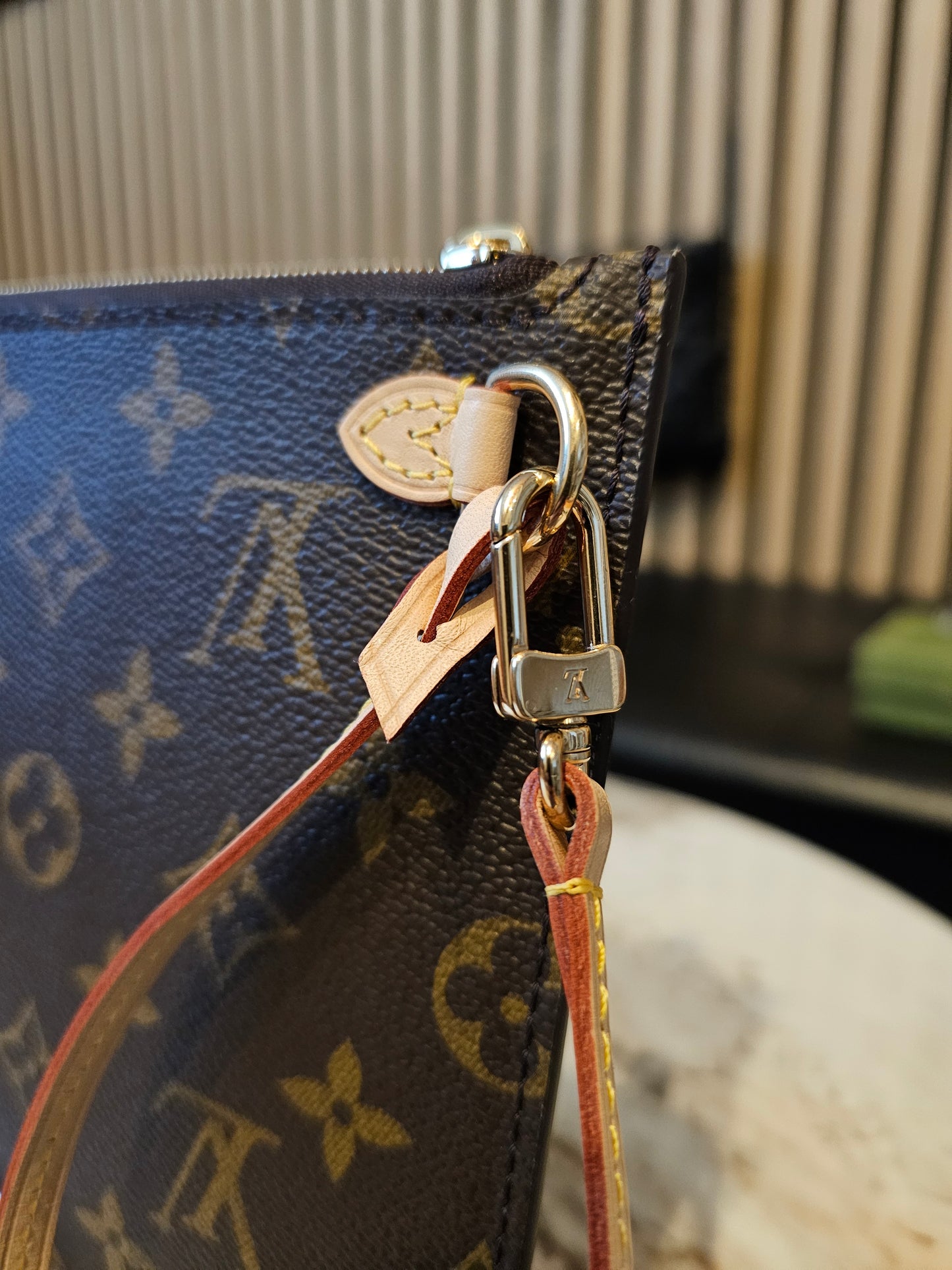 Neverfull Clutch I monogram kanvas - MM size.