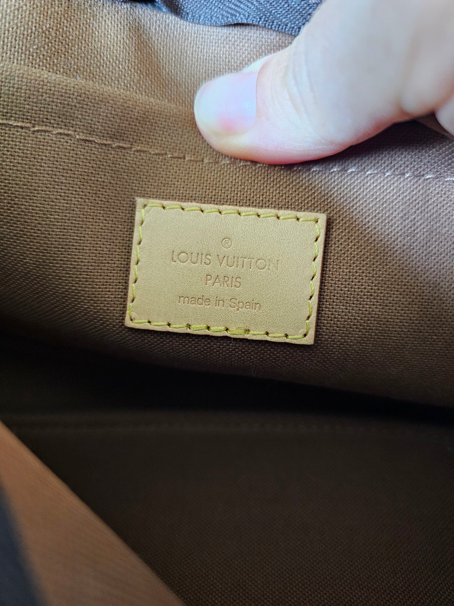 Louis Vuitton pochette accesories, monogram kanvas.